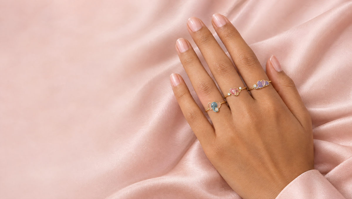 Little Tusks silver rings – three enamel baby elephant rings with certified diamonds worn on the hand