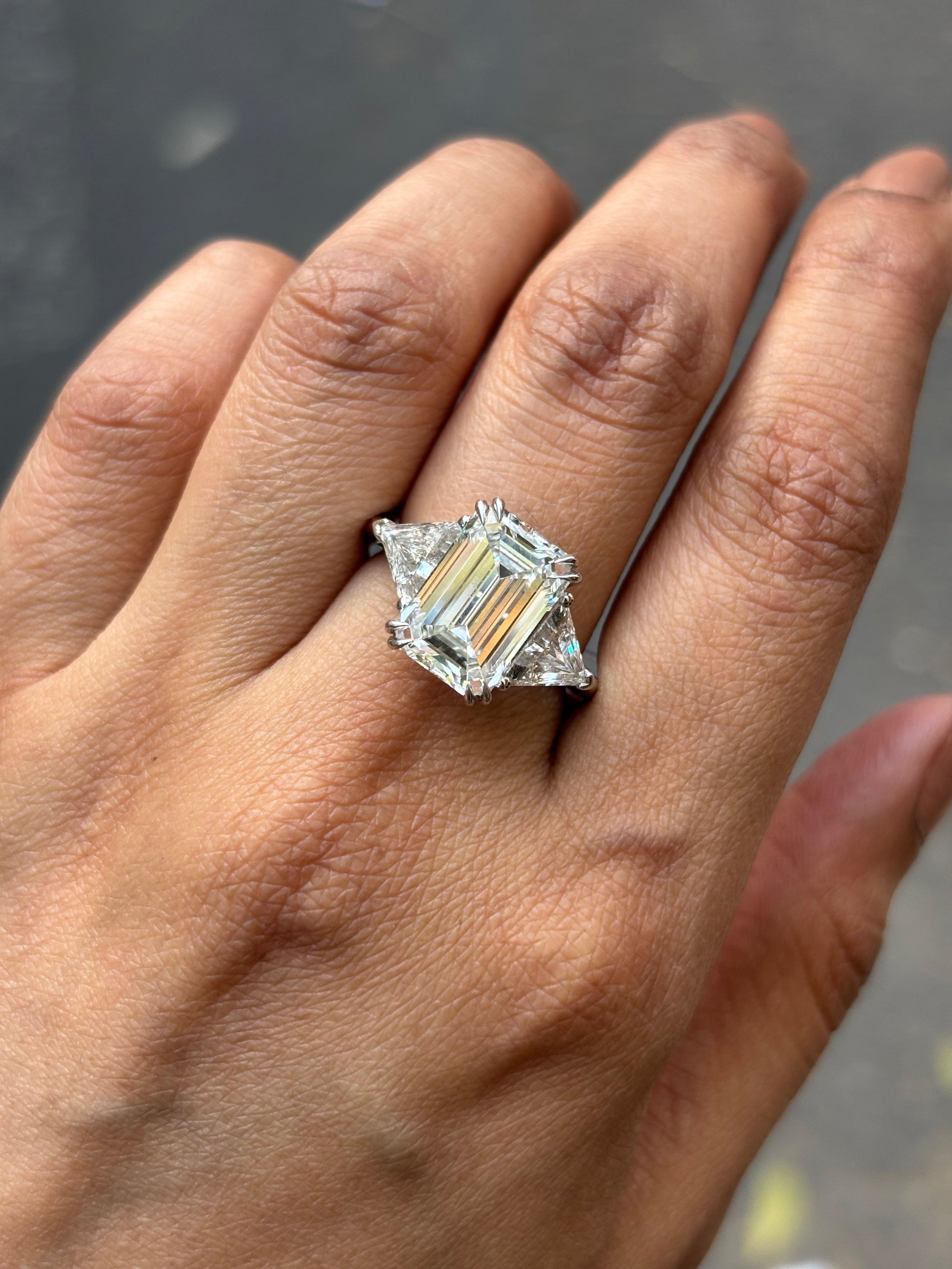 Close-up of Bin Emerald Lab Diamond Three Stone Ring set in 14K White Gold by Fiona Diamonds