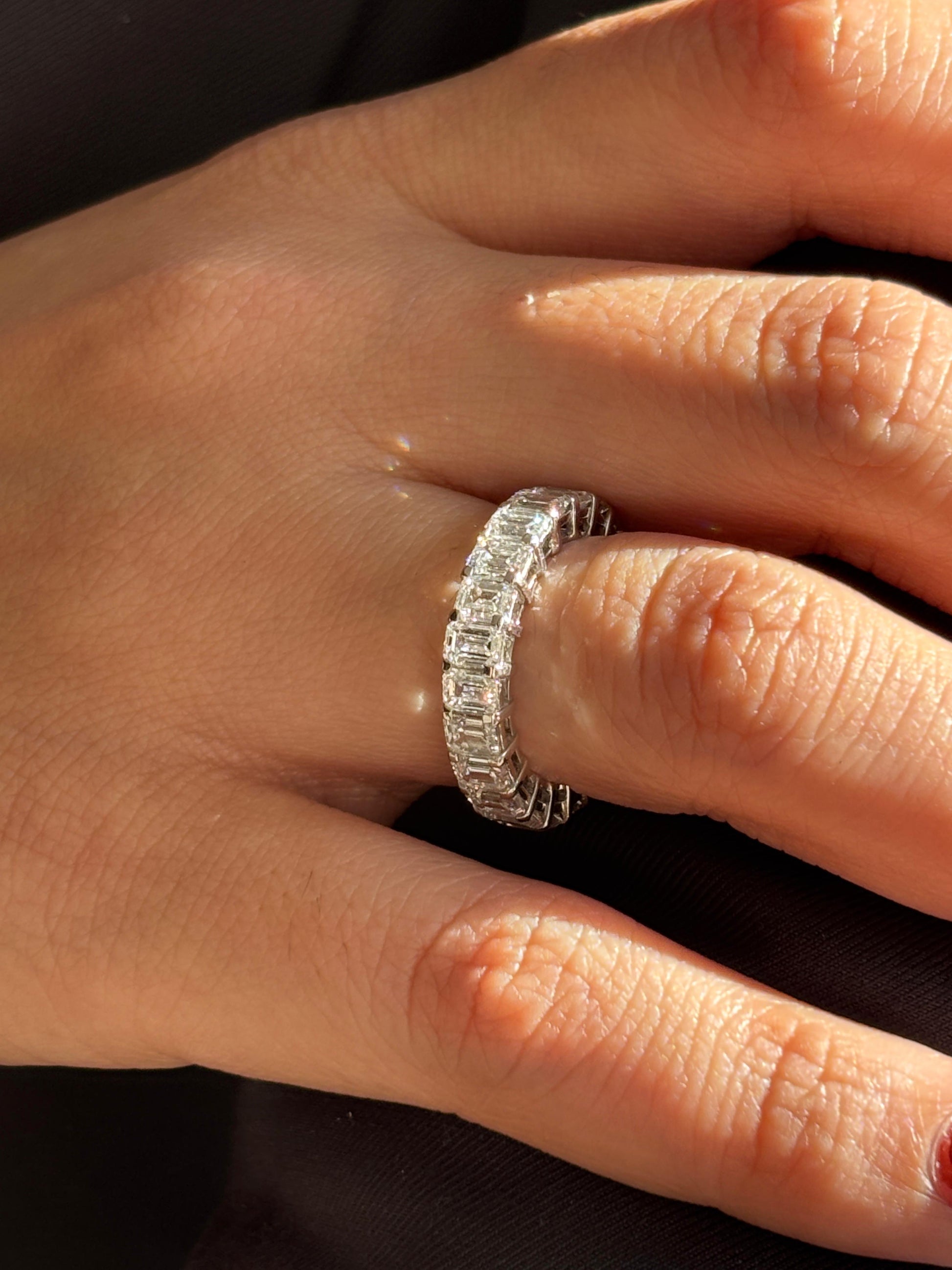 Close-up of Aelivra Emerald Lab Diamond Eternity Ring set in 18K White Gold by Fiona Diamonds
