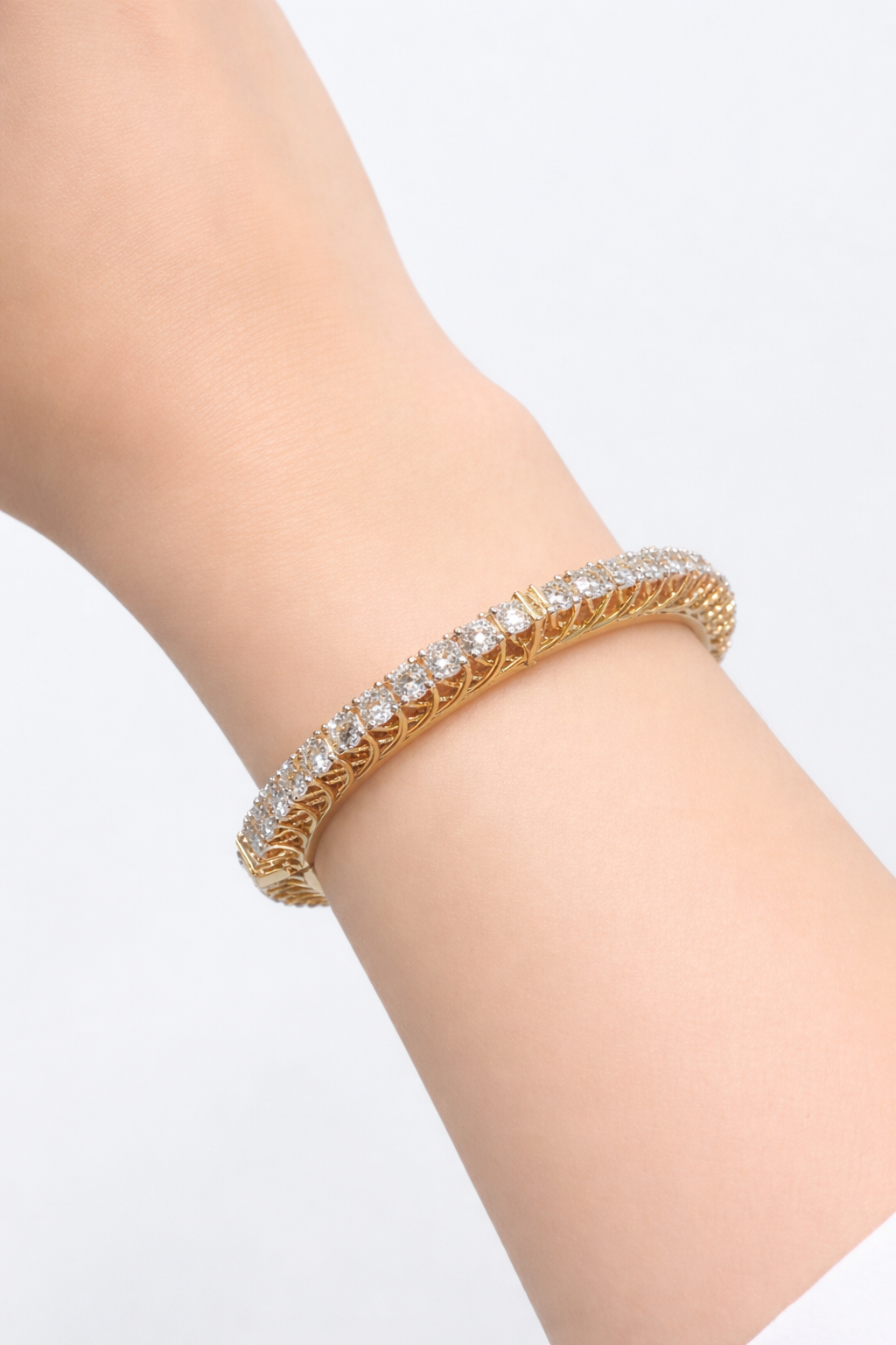Close-up of Lumen Cuff Round Lab Diamond Solitaire Bangle in 18K Yellow Gold by Fiona Diamonds