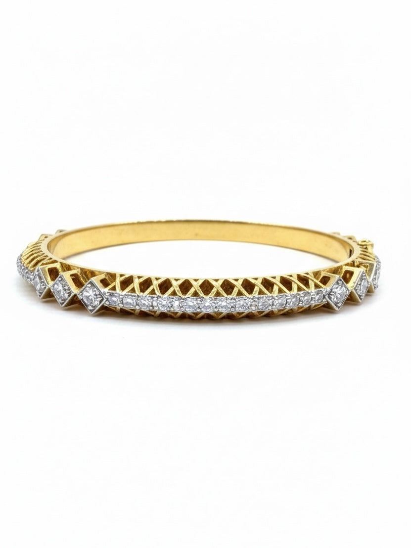 Close-up of Avyx Arc Round Lab Diamond Solitaire Bangle in 14K Yellow Gold by Fiona Diamonds
