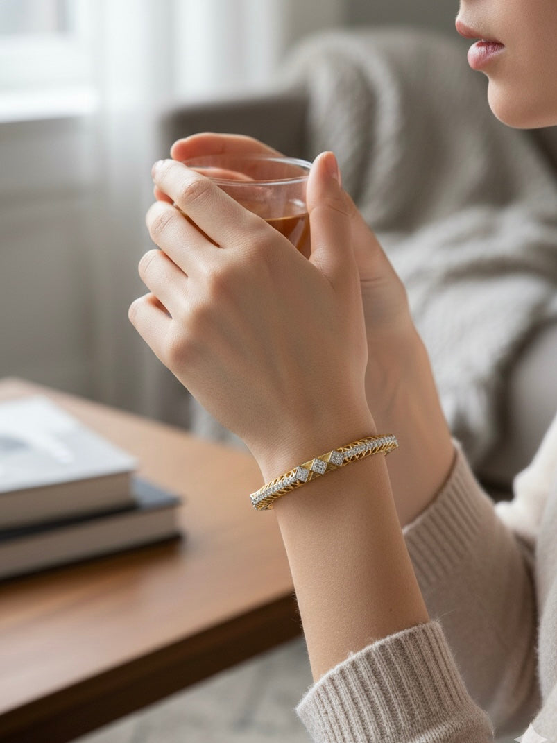 Side view of Avyx Arc Round Lab Diamond Solitaire Bangle in 14K Yellow Gold - Fiona Diamonds