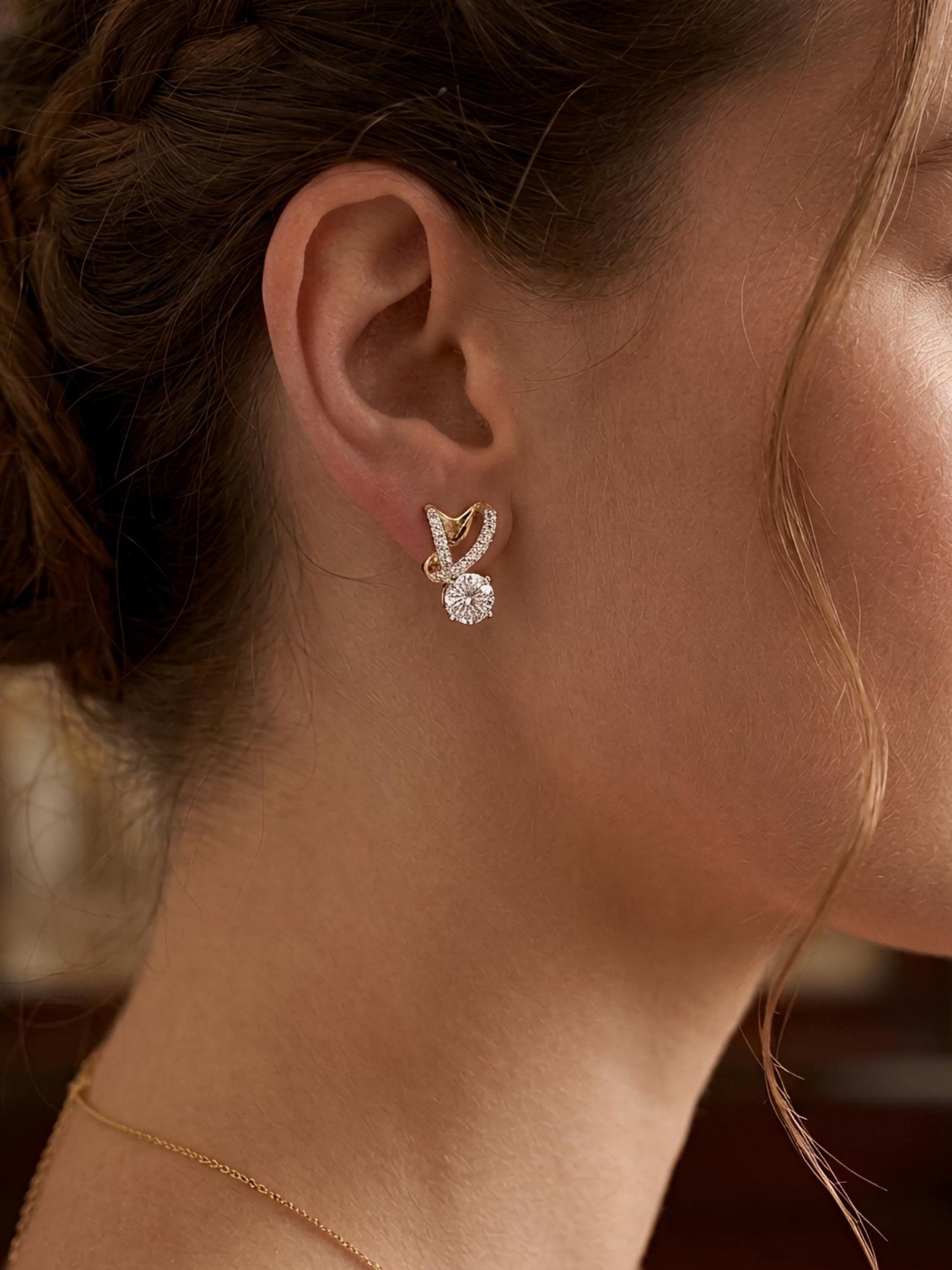 Side view of Caelum Drift Round Lab Diamond Earrings in 18K Rose Gold - Fiona Diamonds