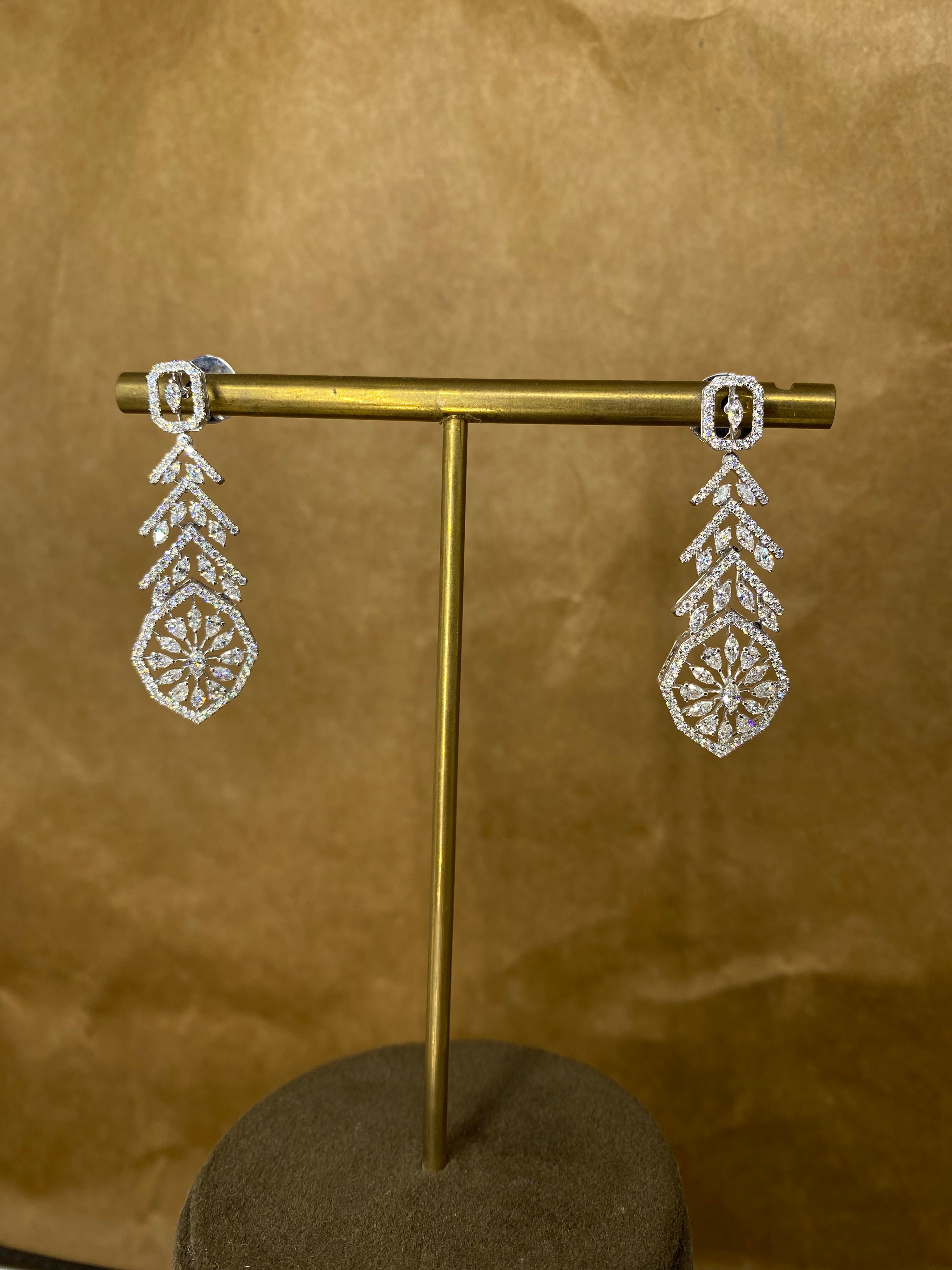 Close-up of Refined Sparkle Pear Lab Diamond Dangler Earrings in 18K White Gold by Fiona Diamonds