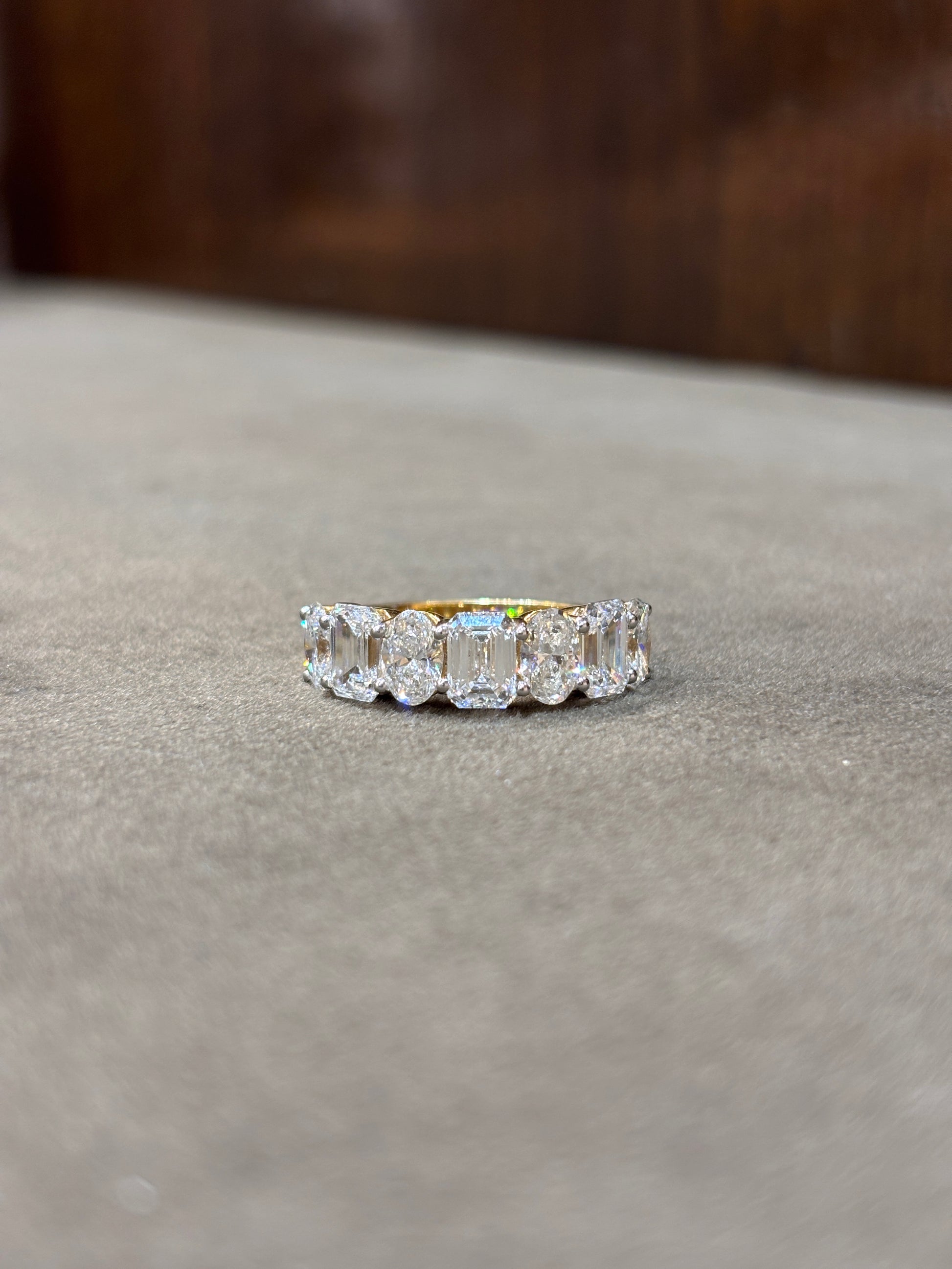 Fiona Diamonds Calora Zenith Oval Lab Diamond Eternity Ring in 18K Yellow Gold on hand