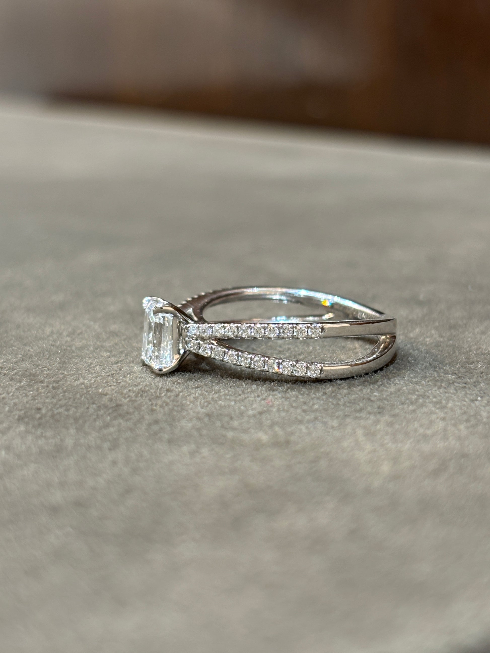 Close-up of 81 Pointer Round Lab Diamond Side Stone Solitaire Ring set in 18K White Gold by Fiona Diamonds