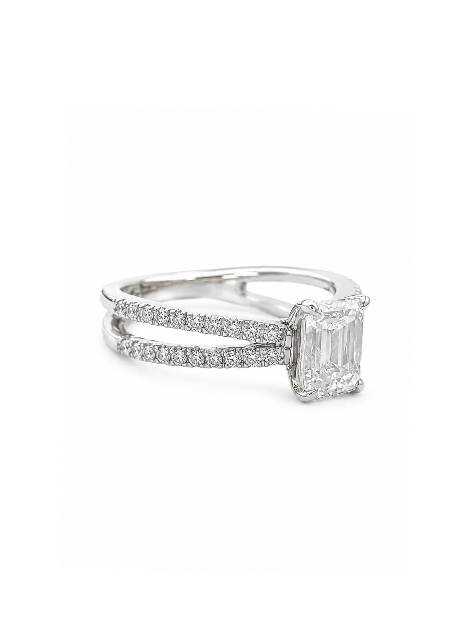 Close-up of Nolan Veil Emerald Lab Diamond Side Stone Solitaire Ring set in 18K White Gold by Fiona Diamonds
