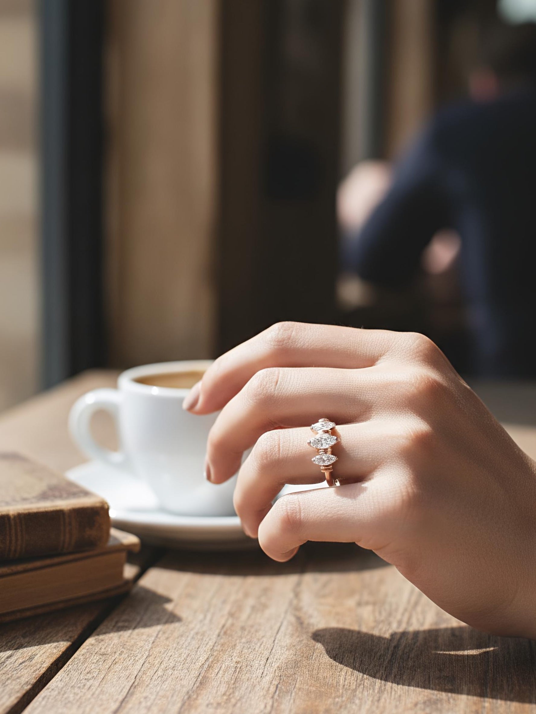 Close-up of Xynexia Band Marquise Lab Diamond Three Stone Ring set in 14K Rose Gold by Fiona Diamonds
