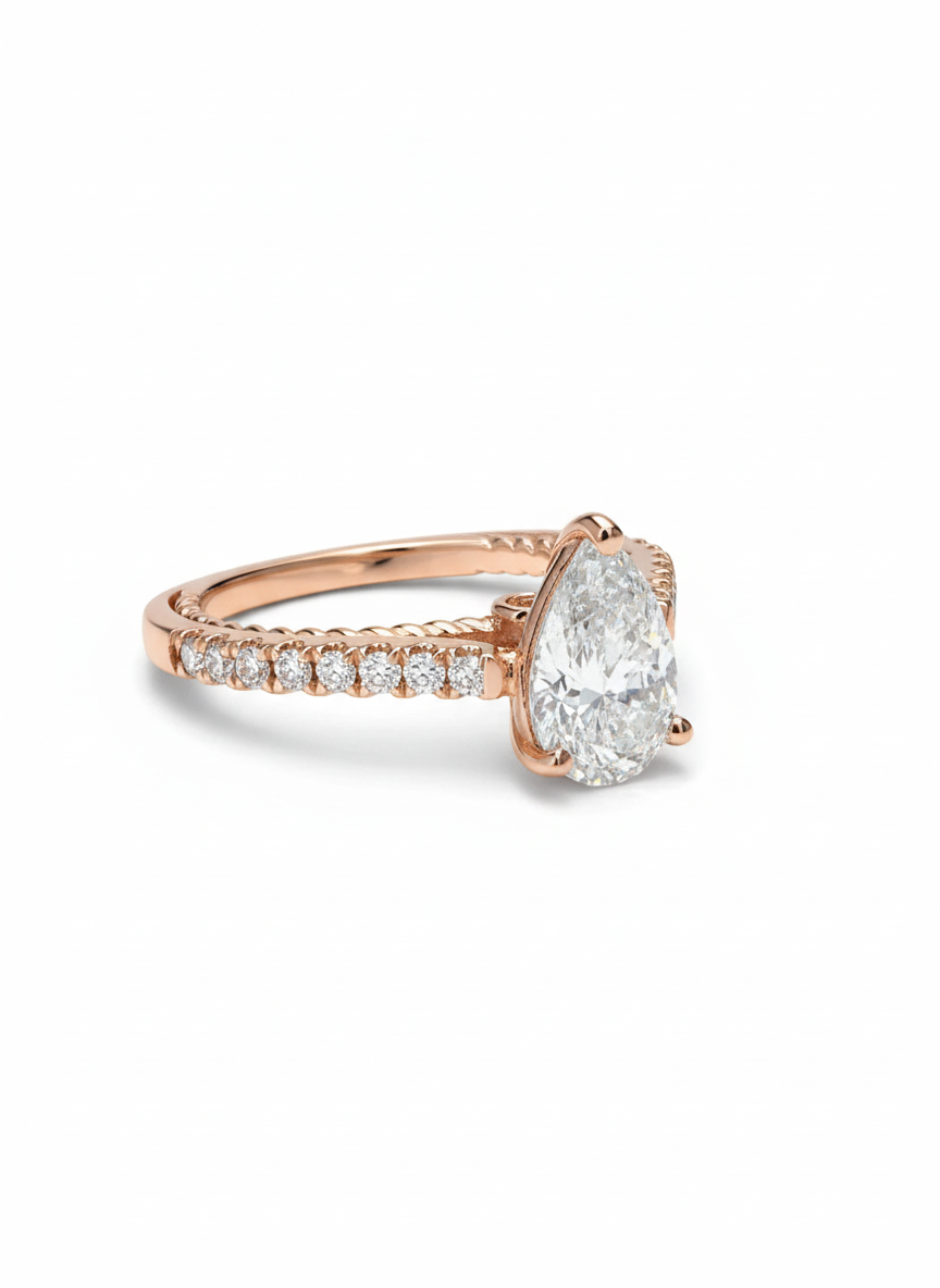 Side view of Zyvion Edge Pear Lab Diamond Side Stone Solitaire Ring in 18K Rose Gold  Fiona Diamonds