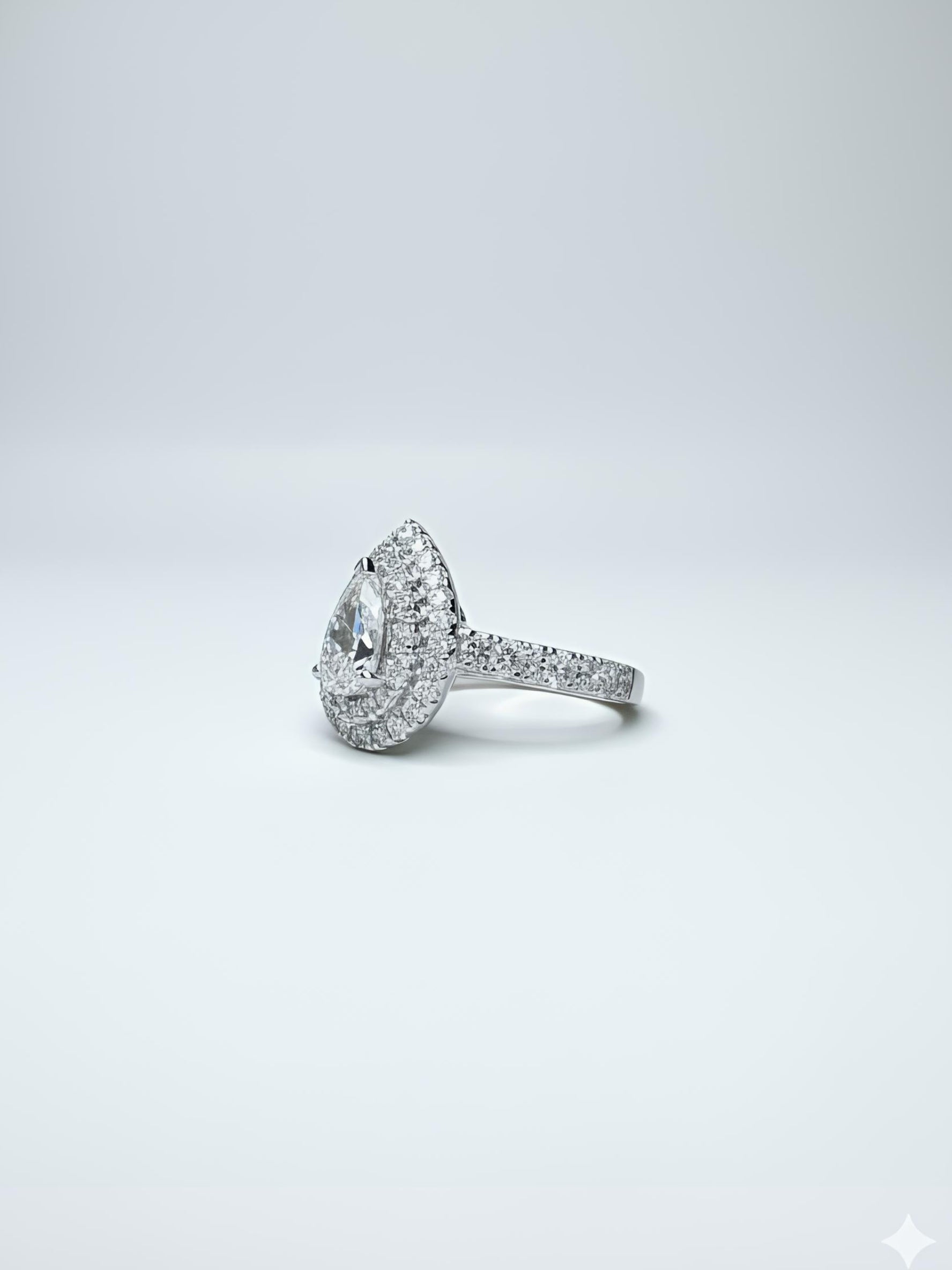 Side view of Avyphrix Band Pear Lab Diamond Halo Ring in 18K White Gold - Fiona Diamonds