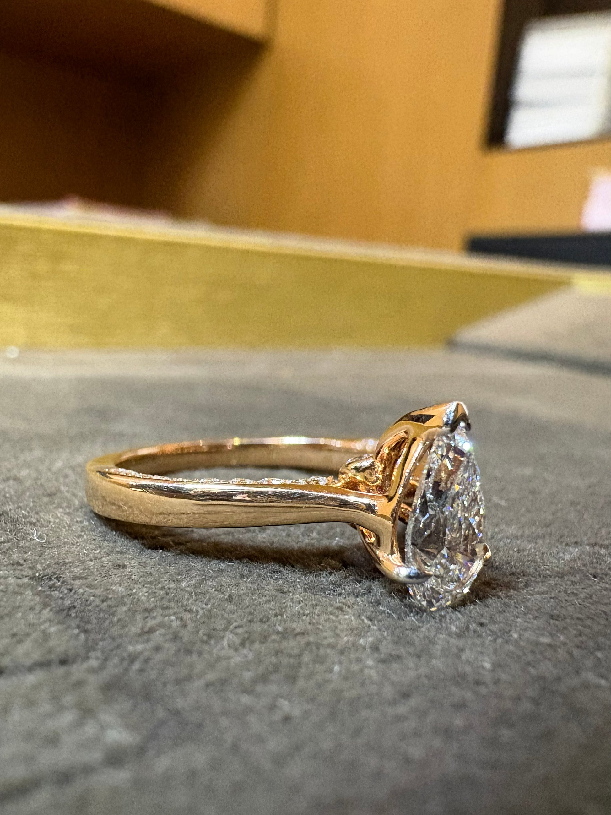 Top view of Ulric Glow Pear Lab Diamond Classic Solitaire Ring in 18K Yellow Gold Fiona Diamonds