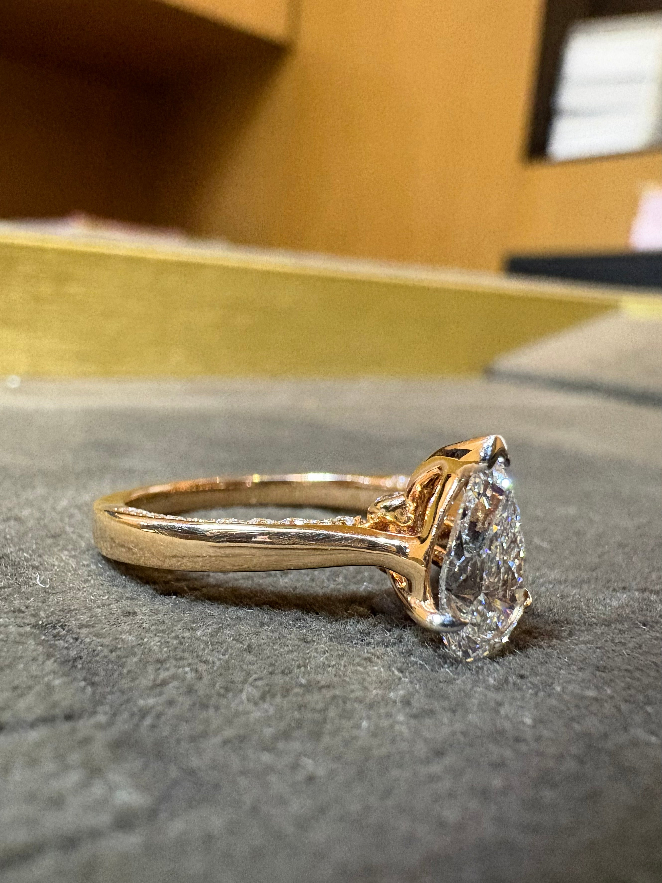 Top view of Ulric Glow Pear Lab Diamond Classic Solitaire Ring in 18K Yellow Gold Fiona Diamonds