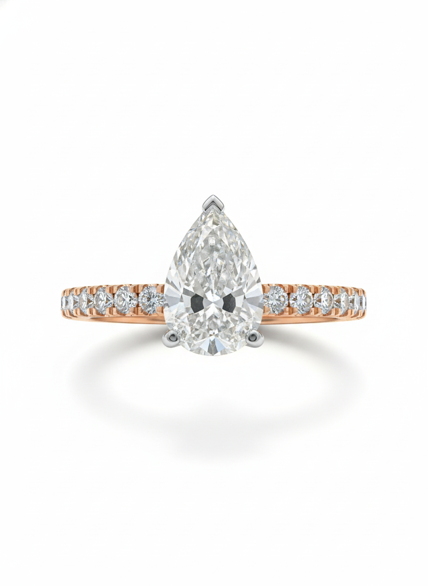 Orbit Crown Pear Lab Diamond Side Stone Solitaire Ring in 18K Rose Gold by Fiona Diamonds