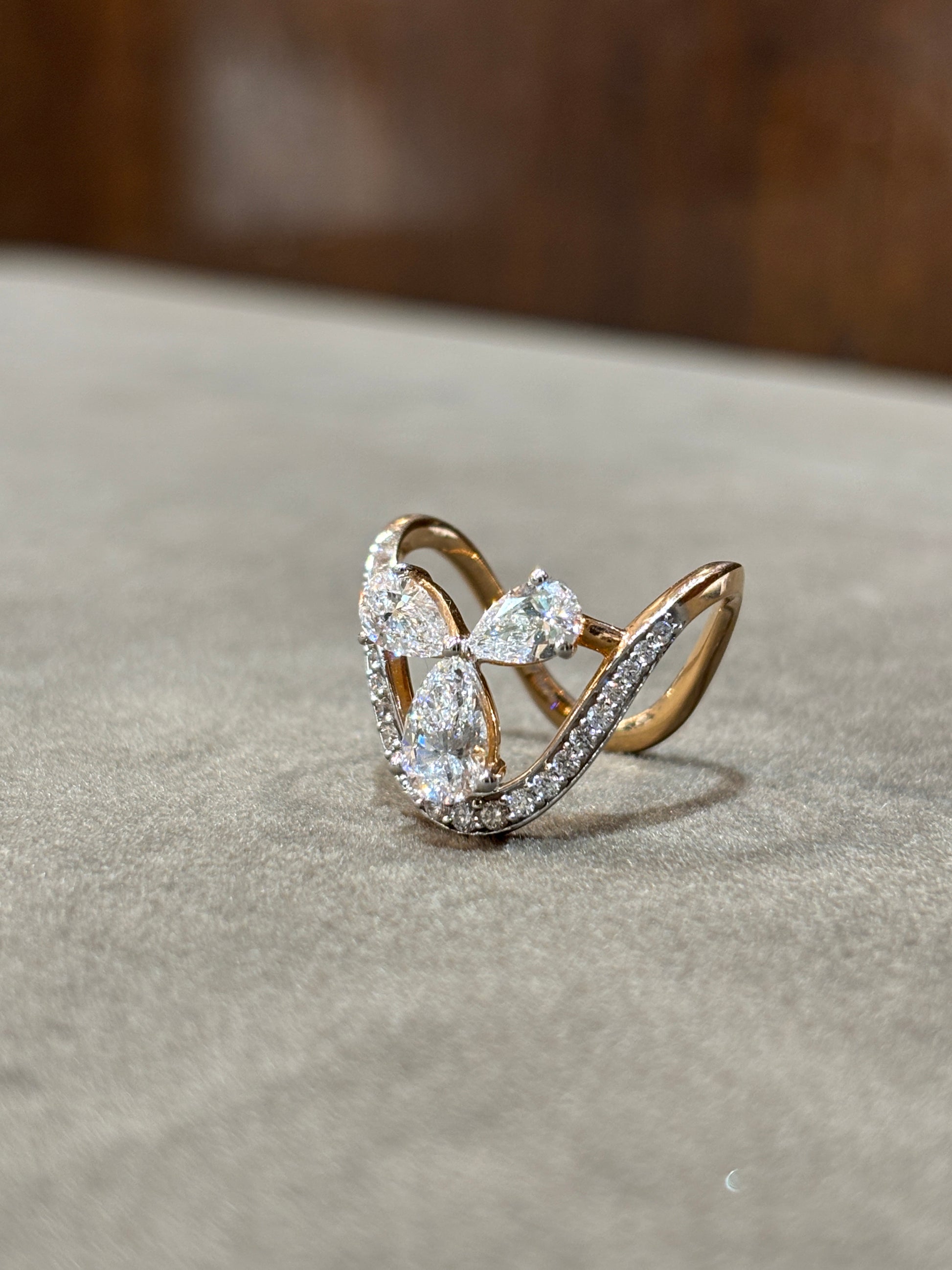 Close -up of Crystal Mirage Pear Lab Diamond Designer Ring set in 18K Rose Gold by Fiona Diamonds