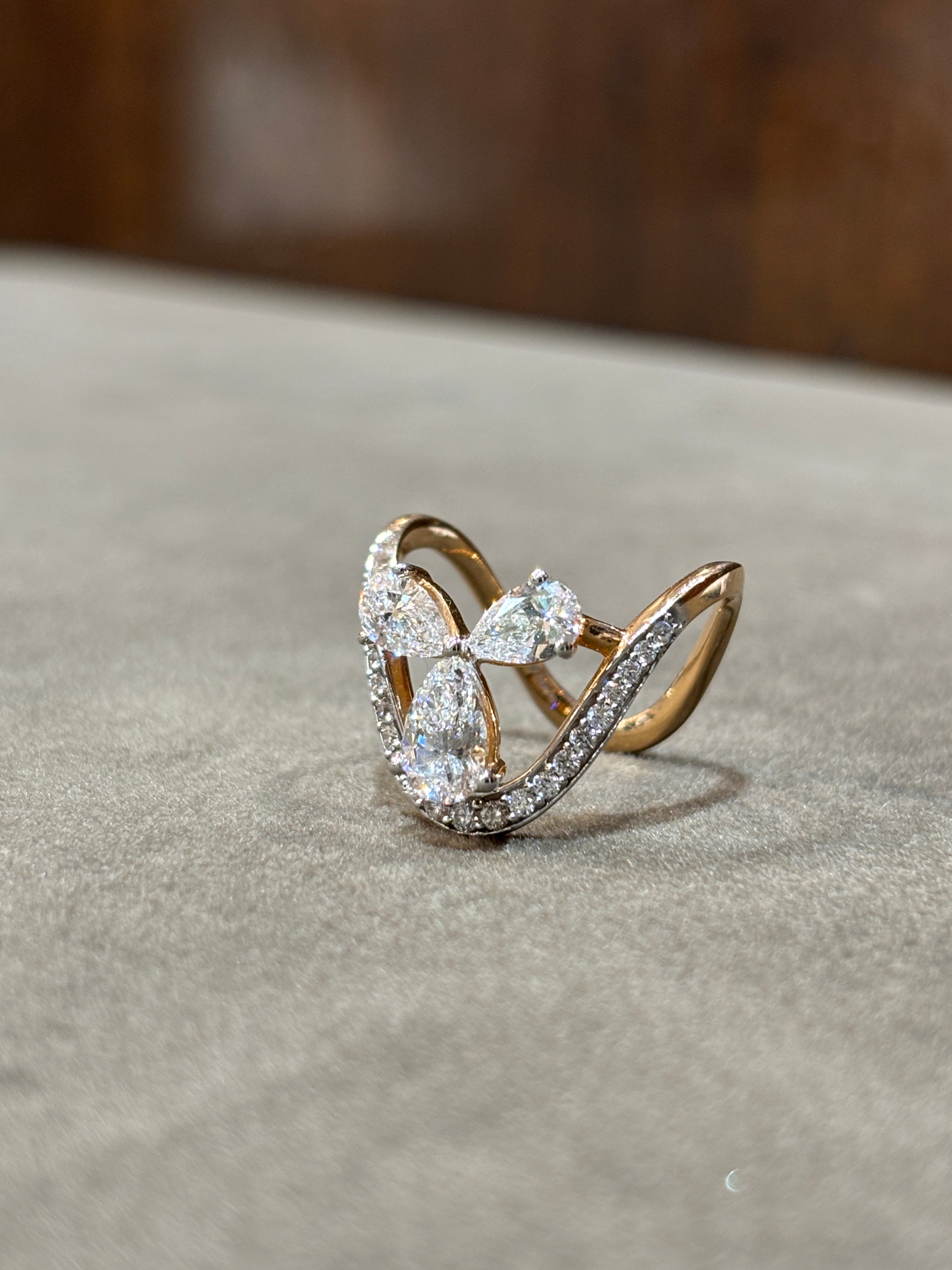Close -up of Crystal Mirage Pear Lab Diamond Designer Ring set in 18K Rose Gold by Fiona Diamonds
