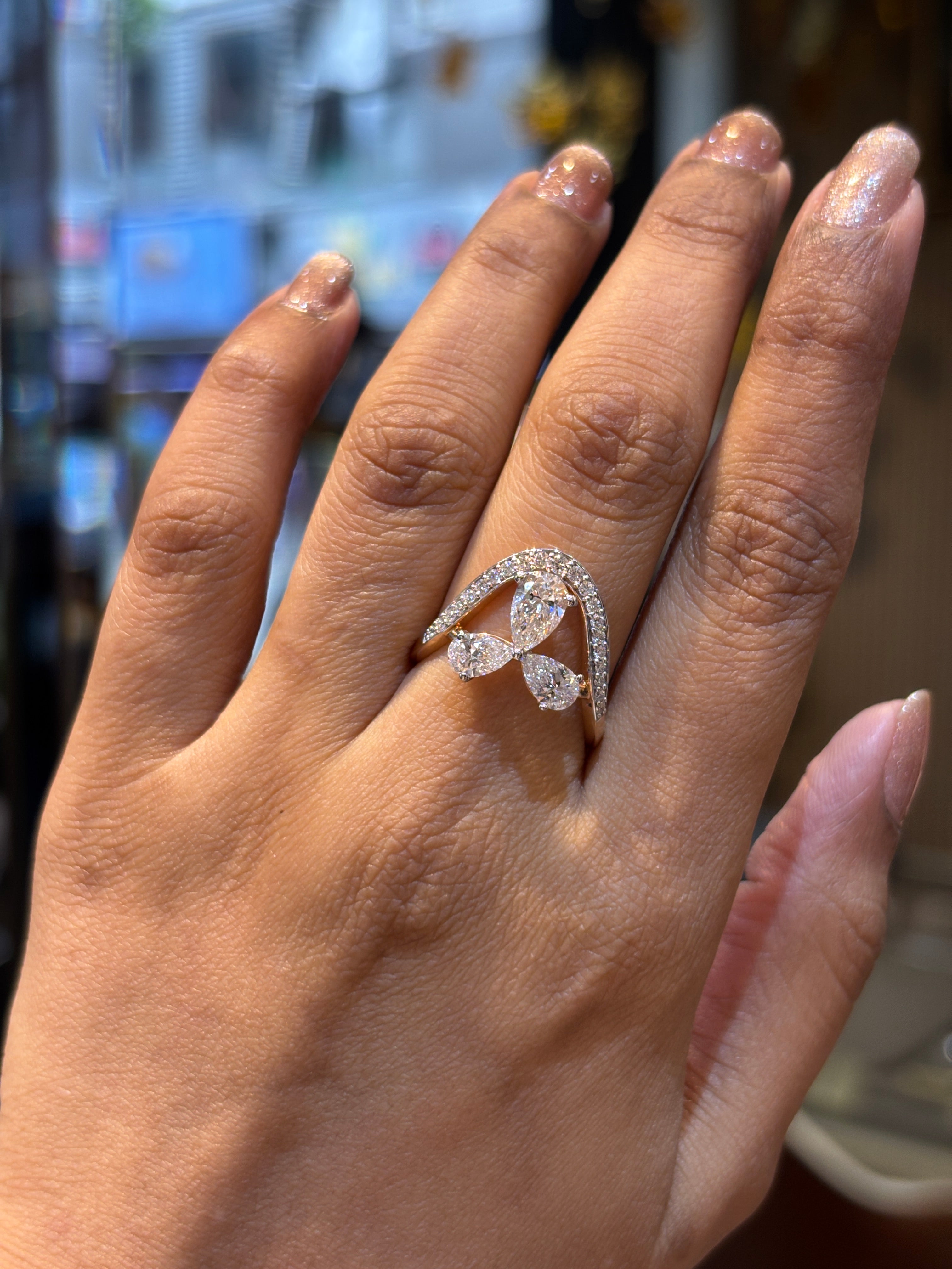 Fiona Diamonds Crystal Mirage Pear Lab Diamond Designer Ring in 18K Rose Gold on hand