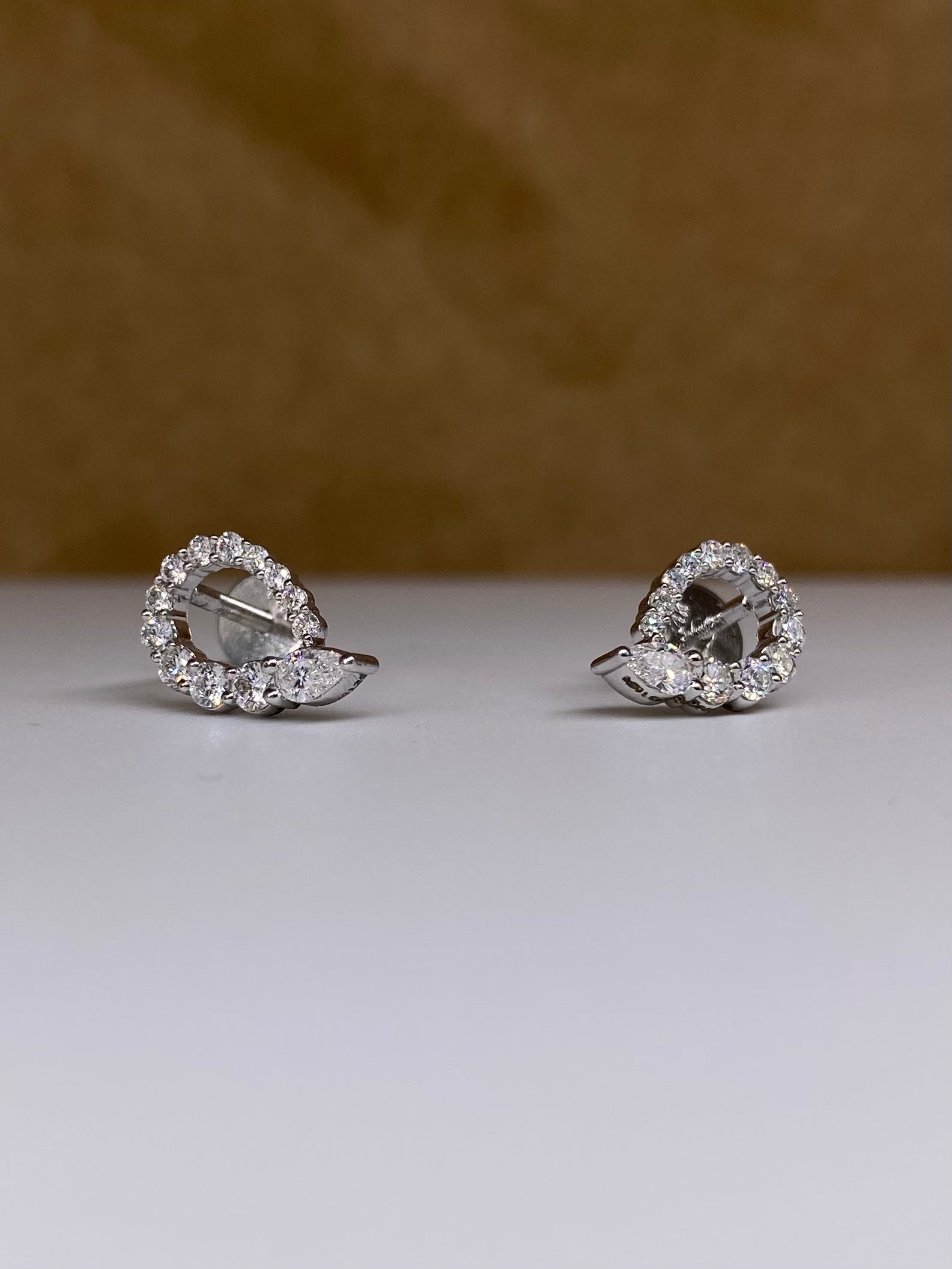 Close-up of Delicate Pear Lab Diamond Earrings in 14K White Gold by Fiona Diamonds