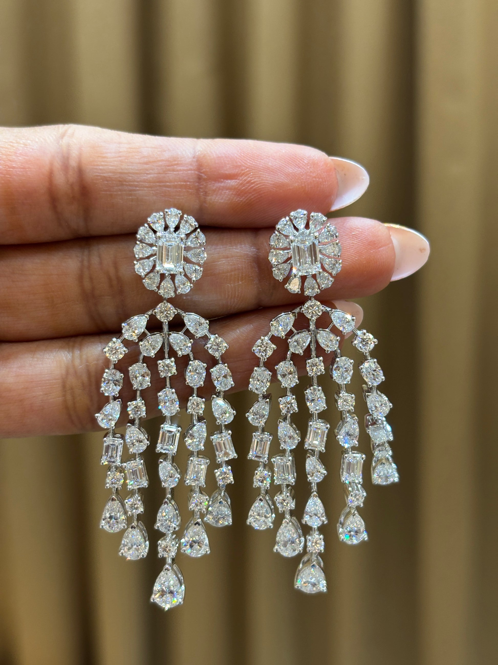 Close-up of Seraph Bloom Emerald Lab Diamond Dangler Earrings in 14K White Gold by Fiona Diamonds