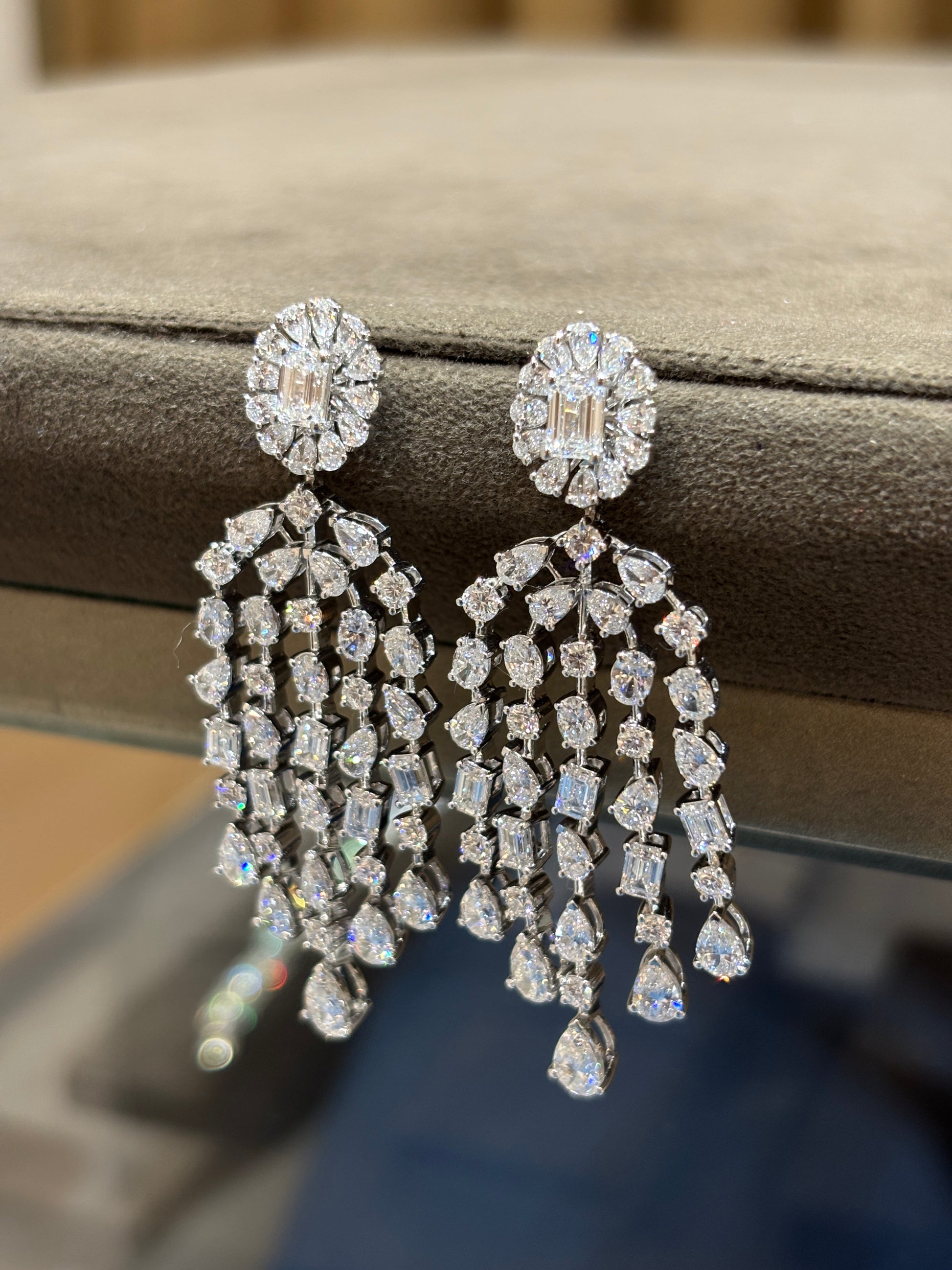Side view of Seraph Bloom Emerald Lab Diamond Dangler Earrings in 14K White Gold - Fiona Diamonds