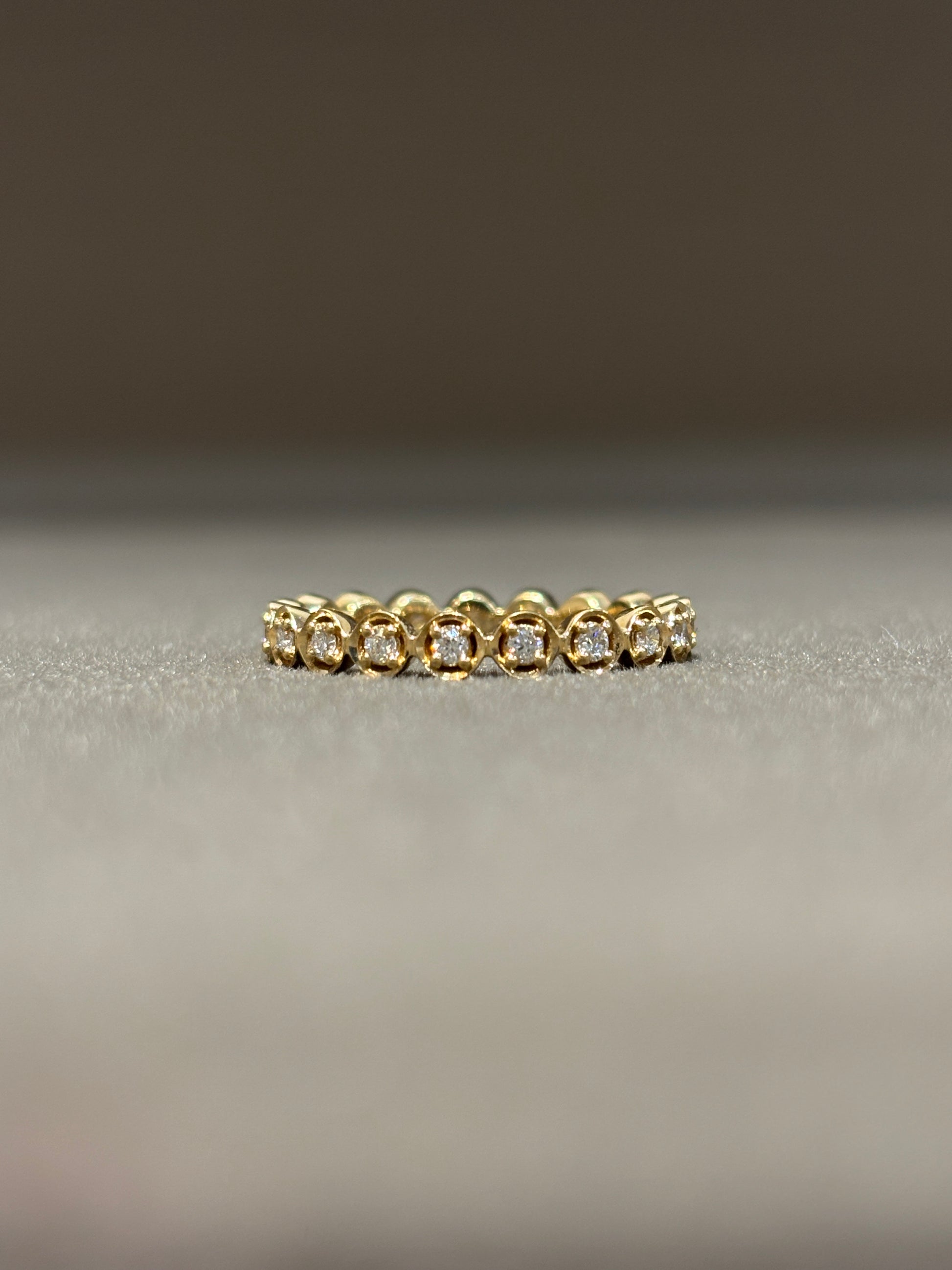 Top view of Wanyi Round Lab Diamond Eternity Ring in 18K Yellow Gold - Fiona Diamonds