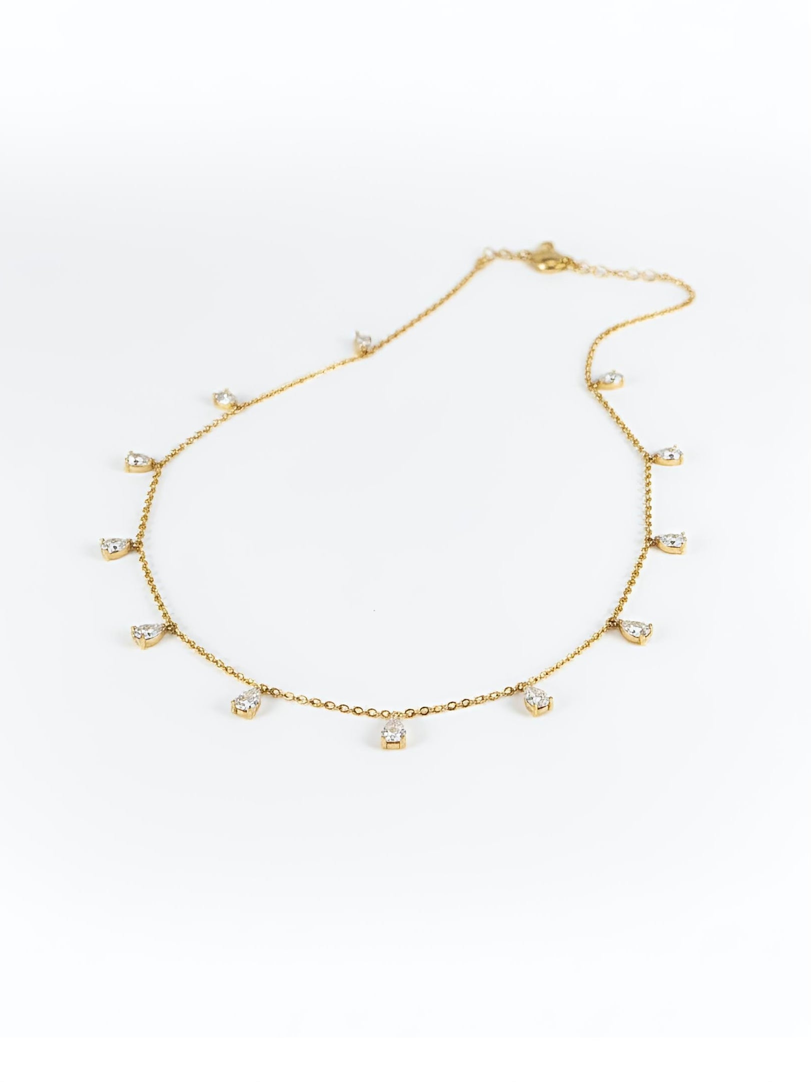 Close-up of Zorixa Strand Pear Lab Diamond Chain Necklace in 18K Rose Gold by Fiona Diamonds