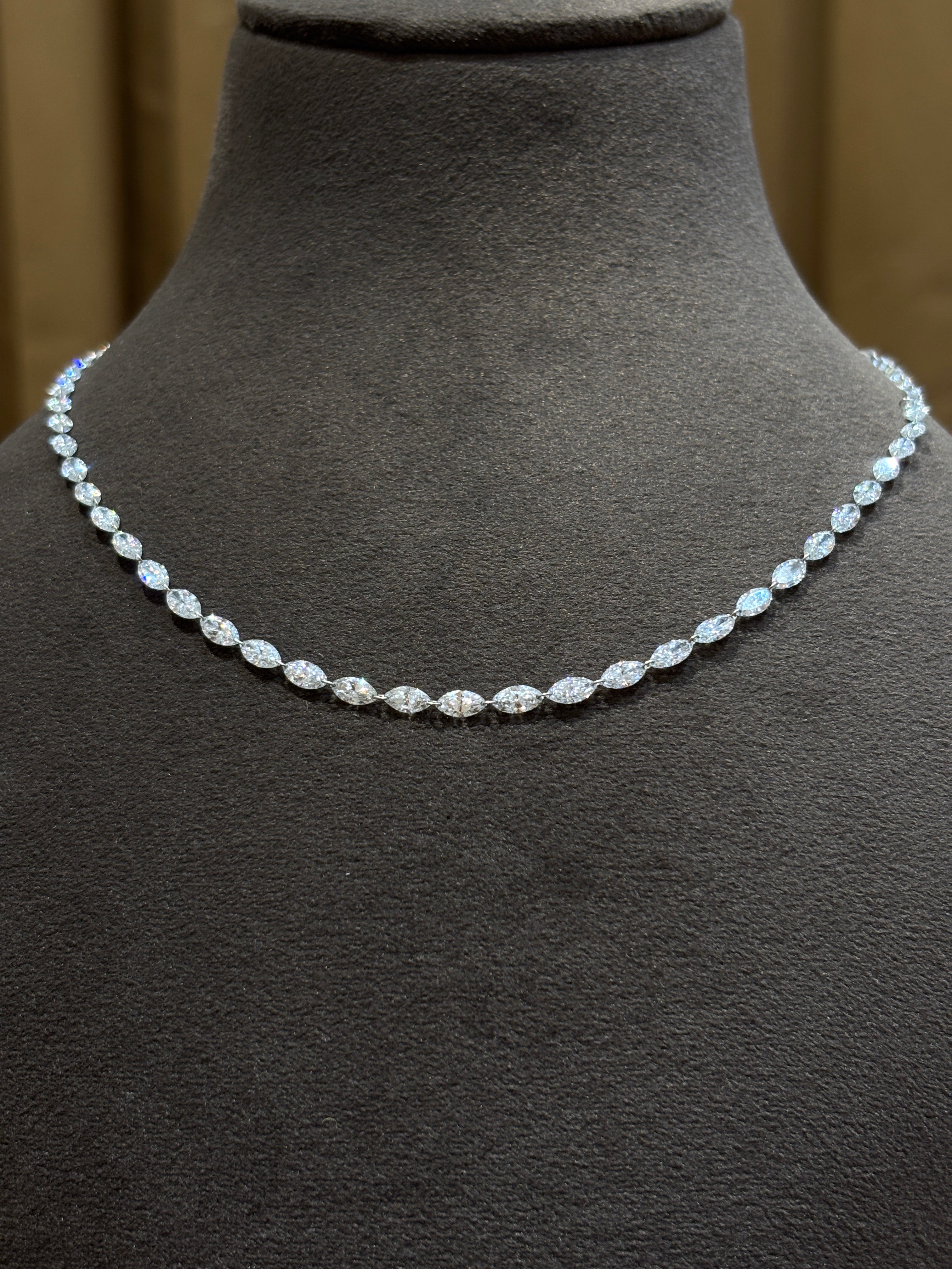 Close-up of Noir Lumière Marquise Lab Diamond Tennis Necklace in 18K Yellow Gold by Fiona Diamonds