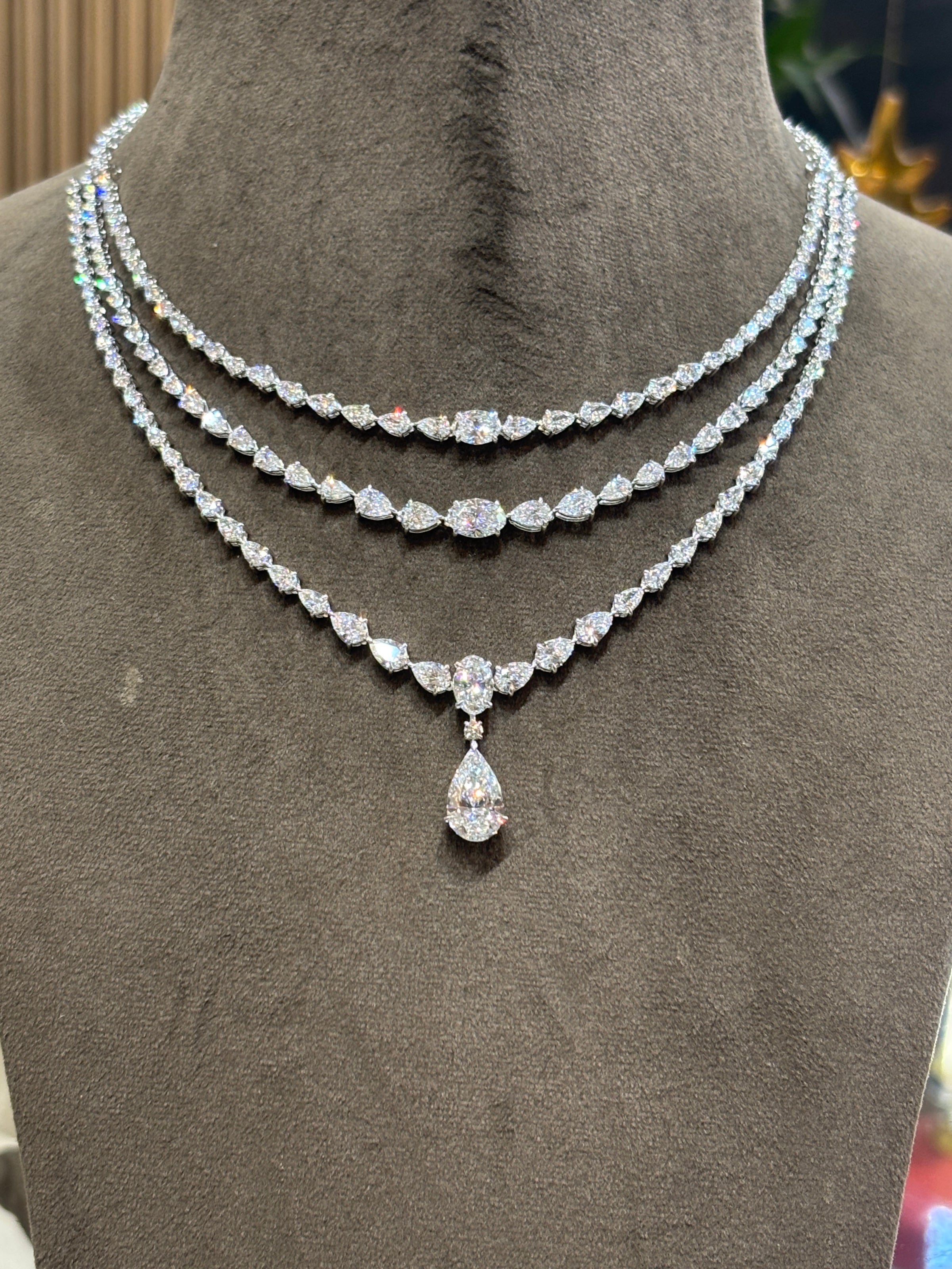 Close-up of Velmira Elan Pear Lab Diamond Designer Necklace in 14K White Gold by Fiona Diamonds