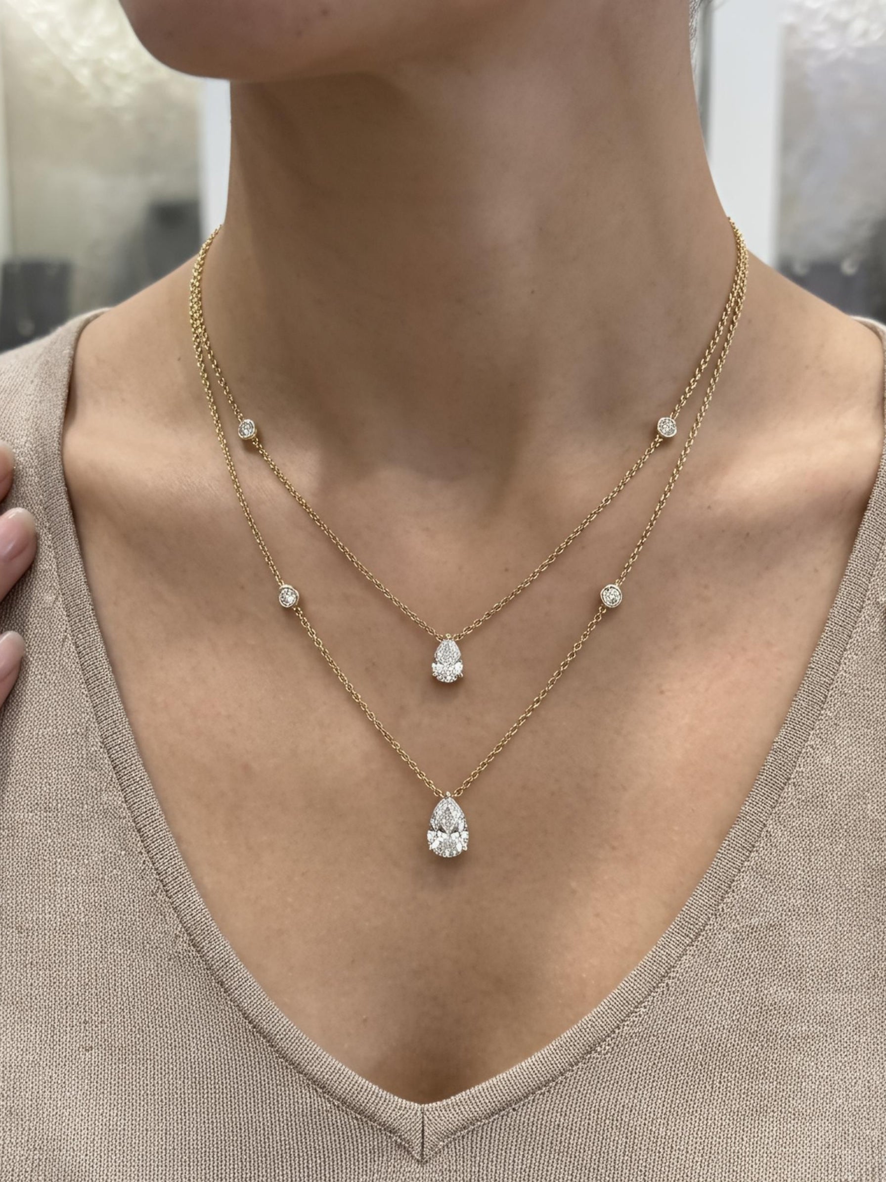 Close-up of Wren Blaze Pear Lab Diamond Chain Necklace in 18K Yellow Gold by Fiona Diamonds