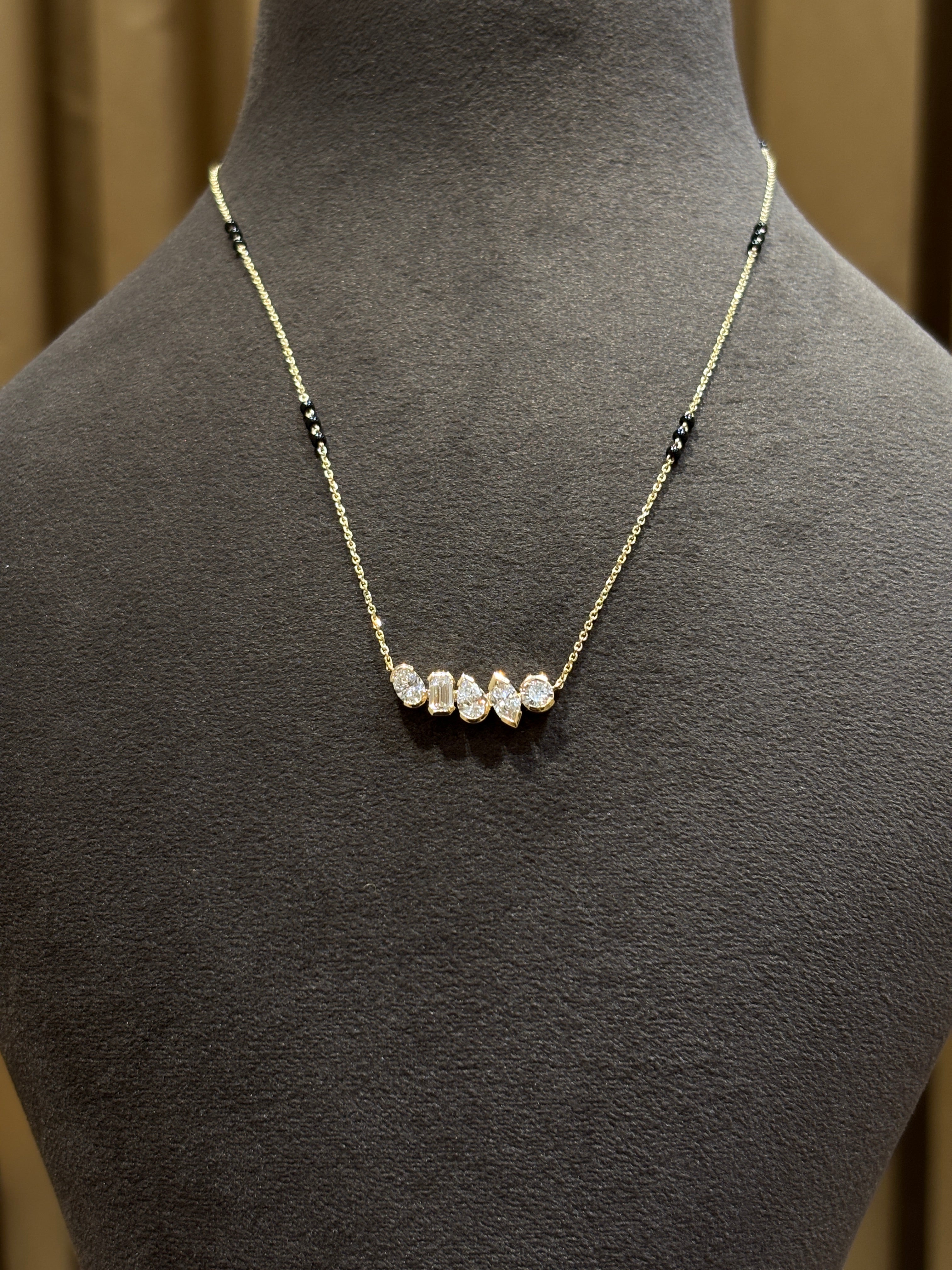 Close-up of Eternal Radiance Oval Lab Diamond Mangalsutra in 14K Yellow Gold by Fiona Diamonds