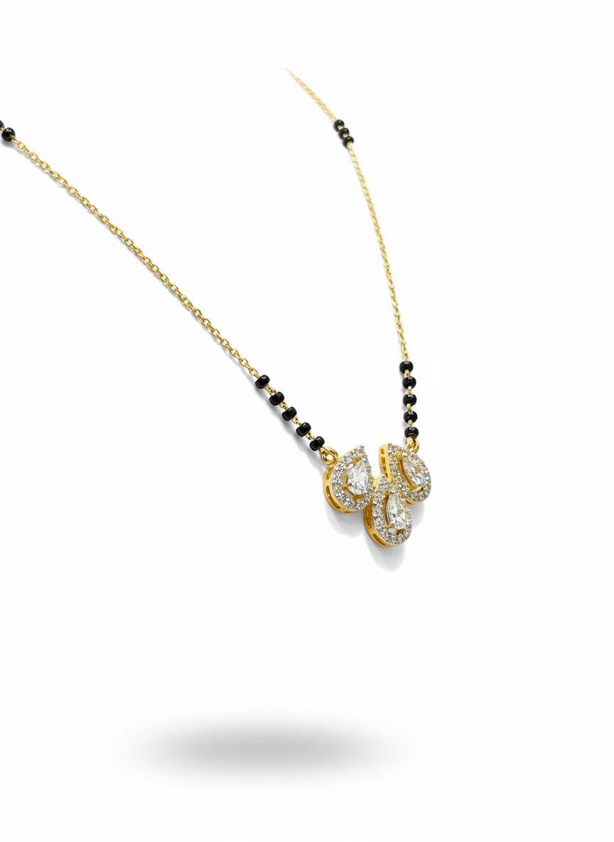 Side view of Amavera Poise Pear Lab Diamond Mangalsutra in 14K Yellow Gold - Fiona Diamonds