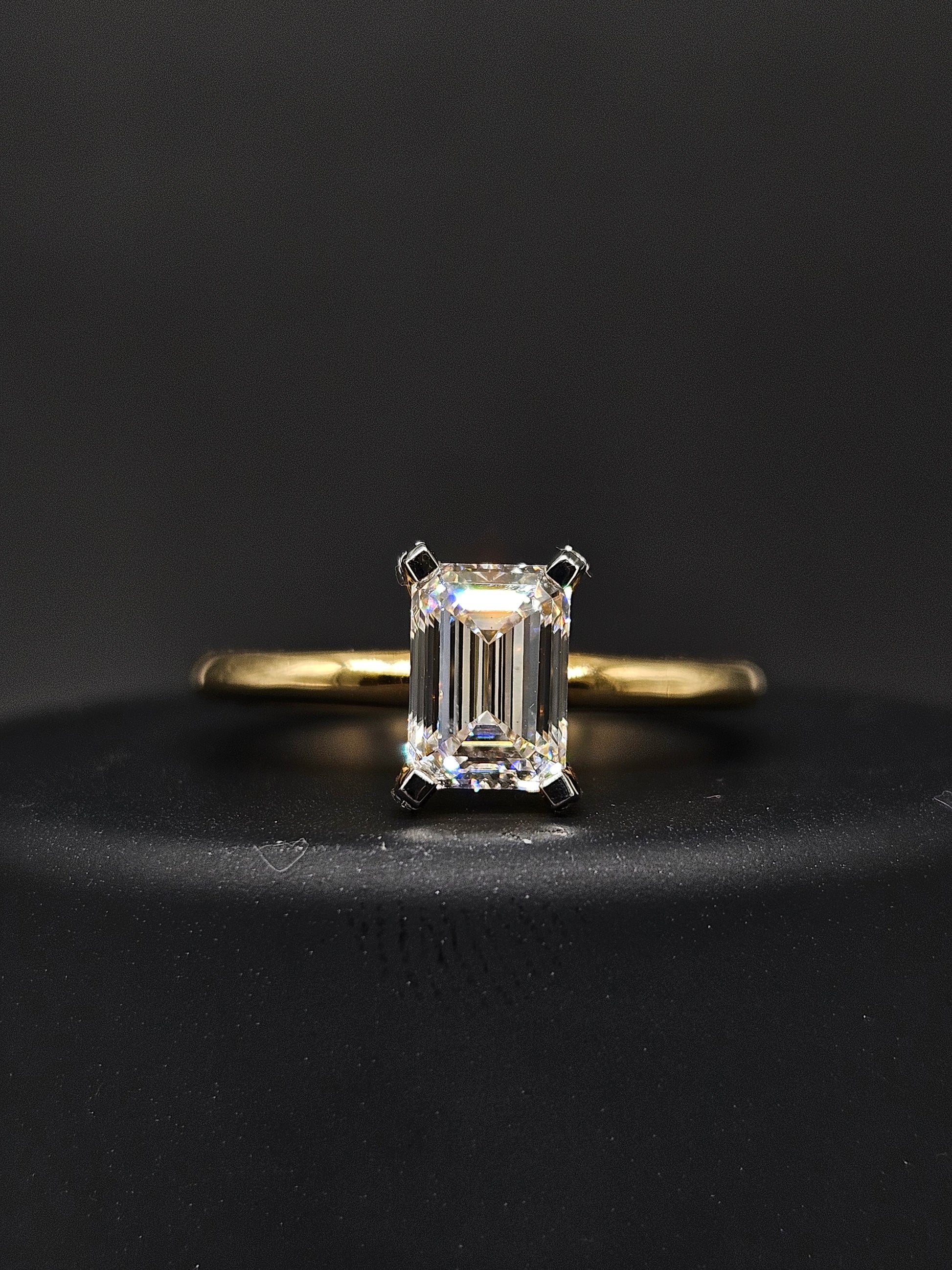 Close-up of Mingxia 1ct Emerald Lab Diamond Classic Solitaire Ring set in 14K Yellow Gold by Fiona Diamonds
