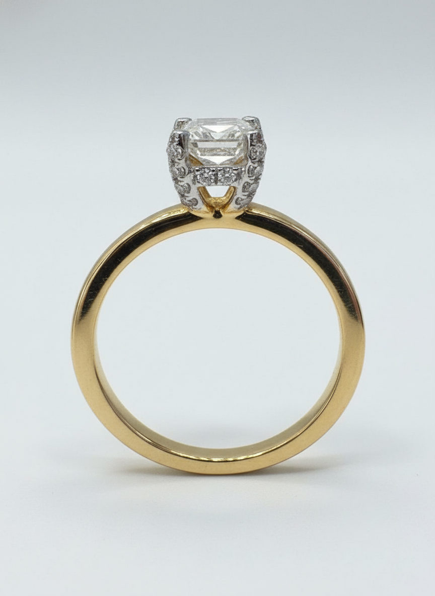 Side profile of Echo Crest Emerald Lab Diamond Classic Solitaire Ring in 14K Yellow Gold Fiona Diamonds