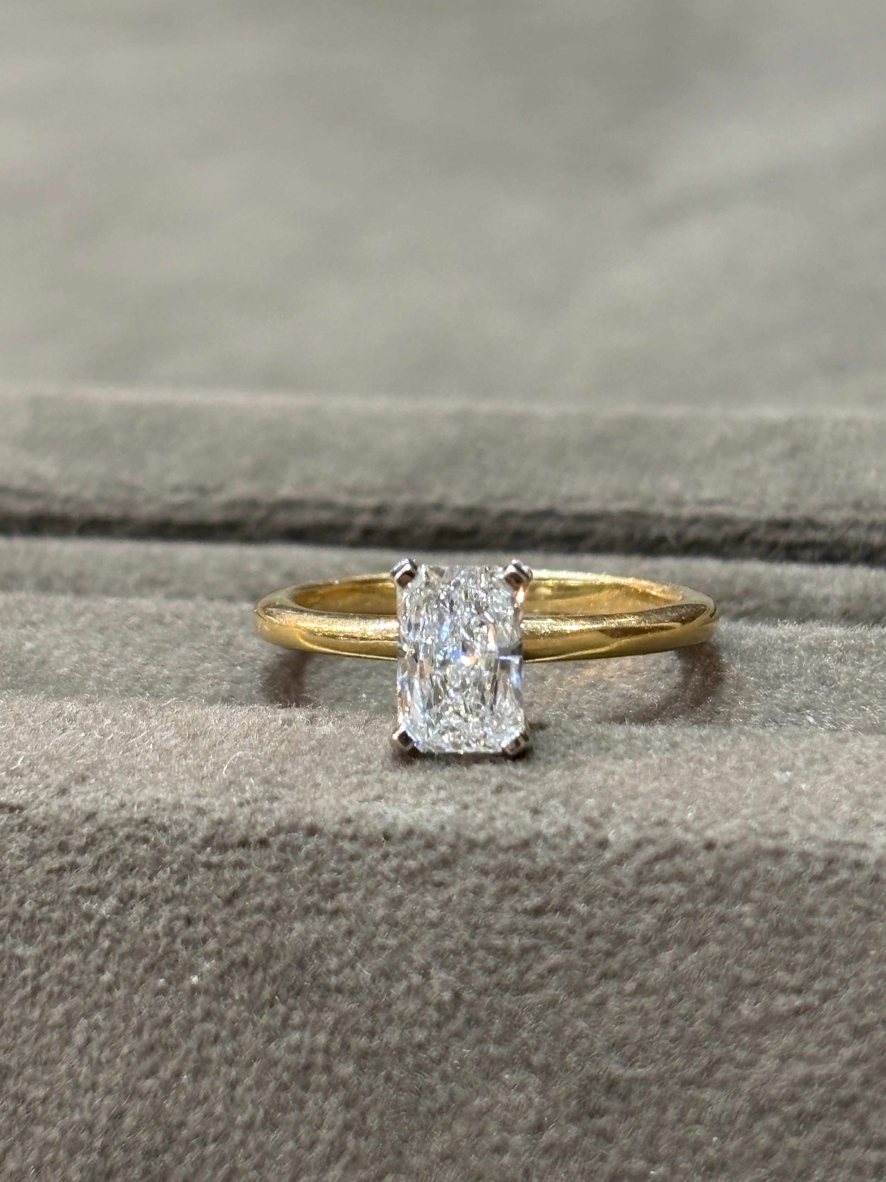 Fiona Diamonds 1ct Radiant Radiant Lab Diamond Classic Solitaire Ring in 14K Yellow Gold on hand