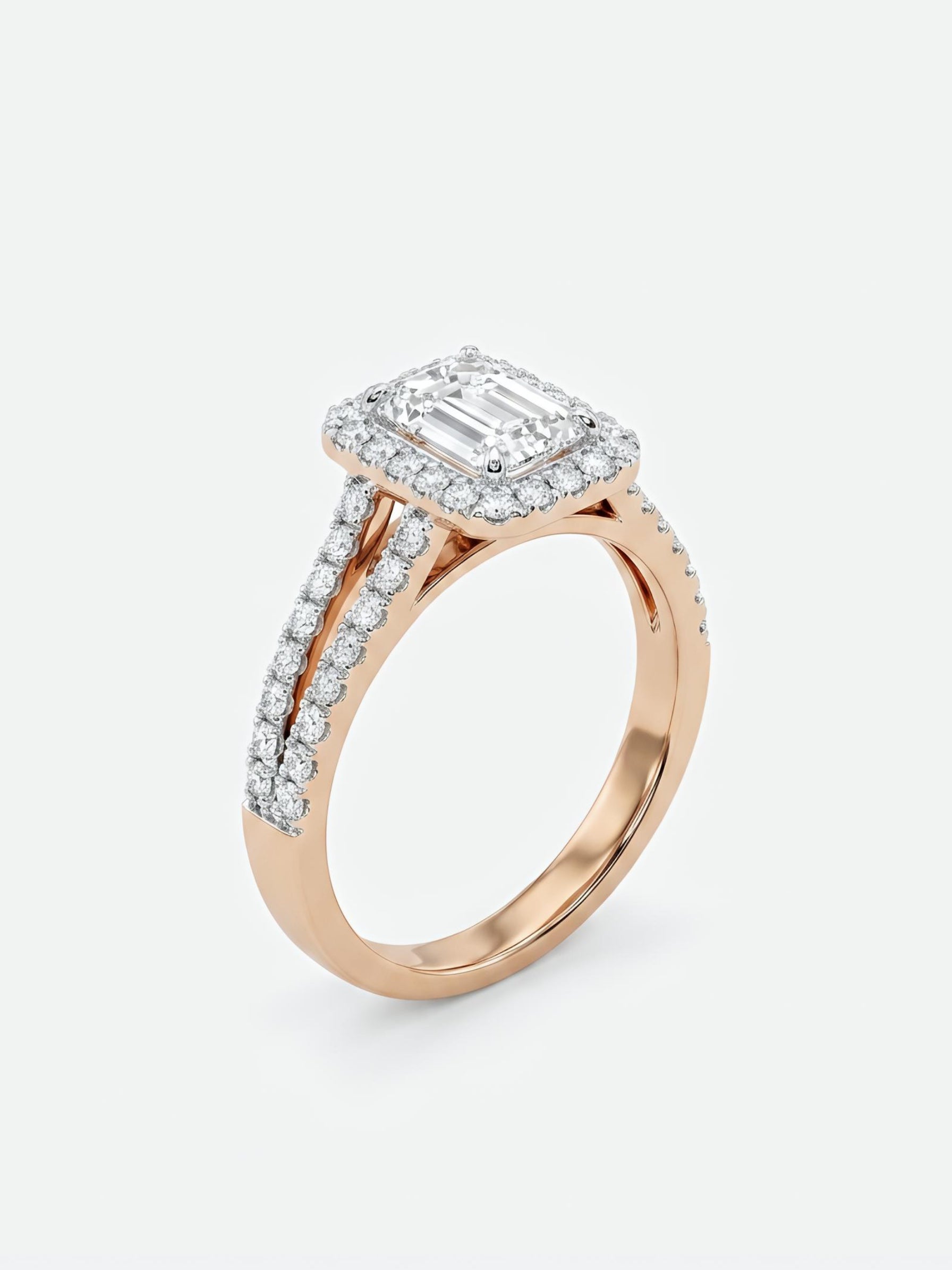 Close-up of Xorixa Band Emerald Lab Diamond Halo Ring set in 14K Rose Gold by Fiona Diamonds