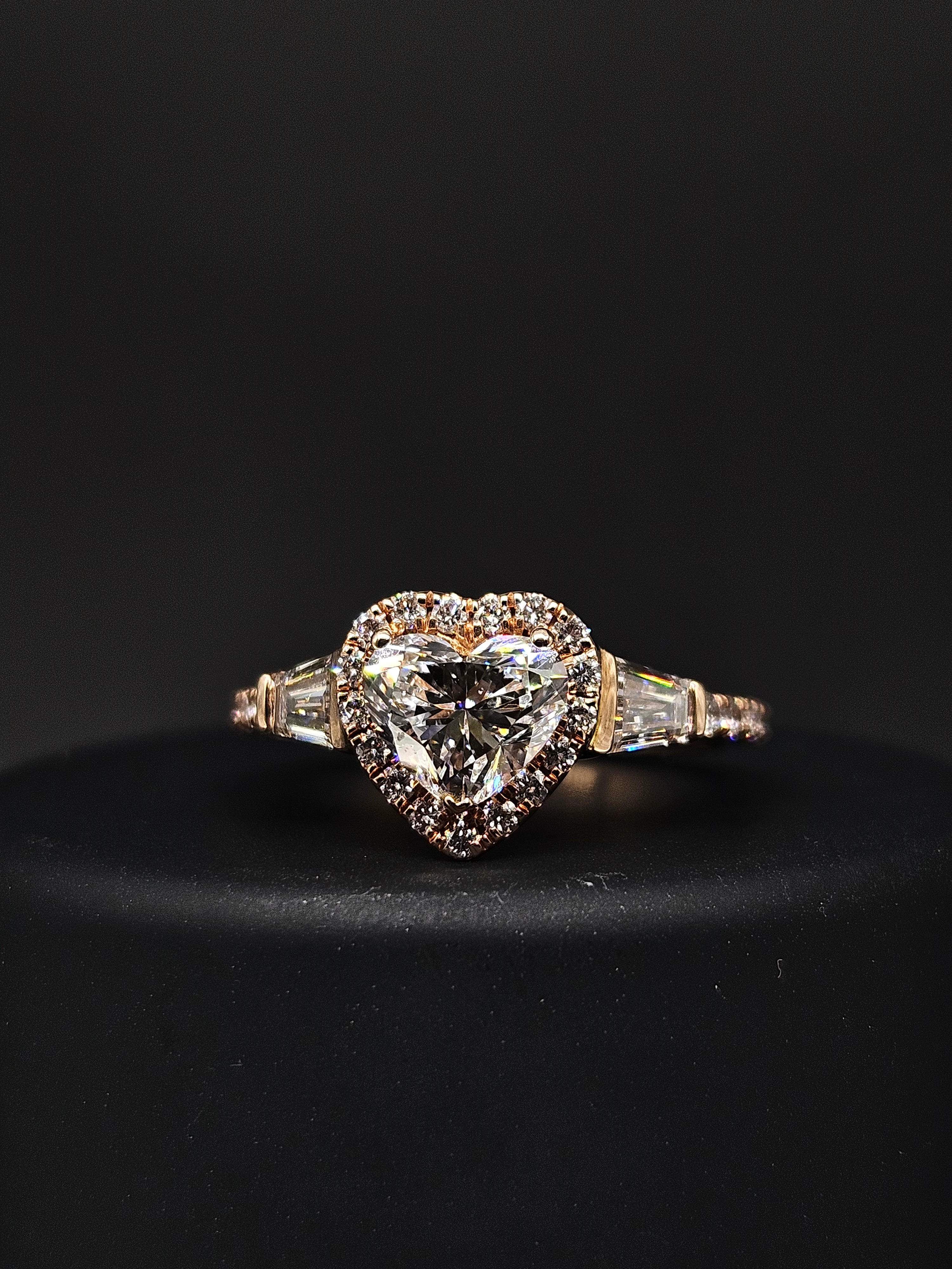 Close-up of Yuxin Heart Lab Diamond Three Stone Ring set in 14K Rose Gold by Fiona Diamonds