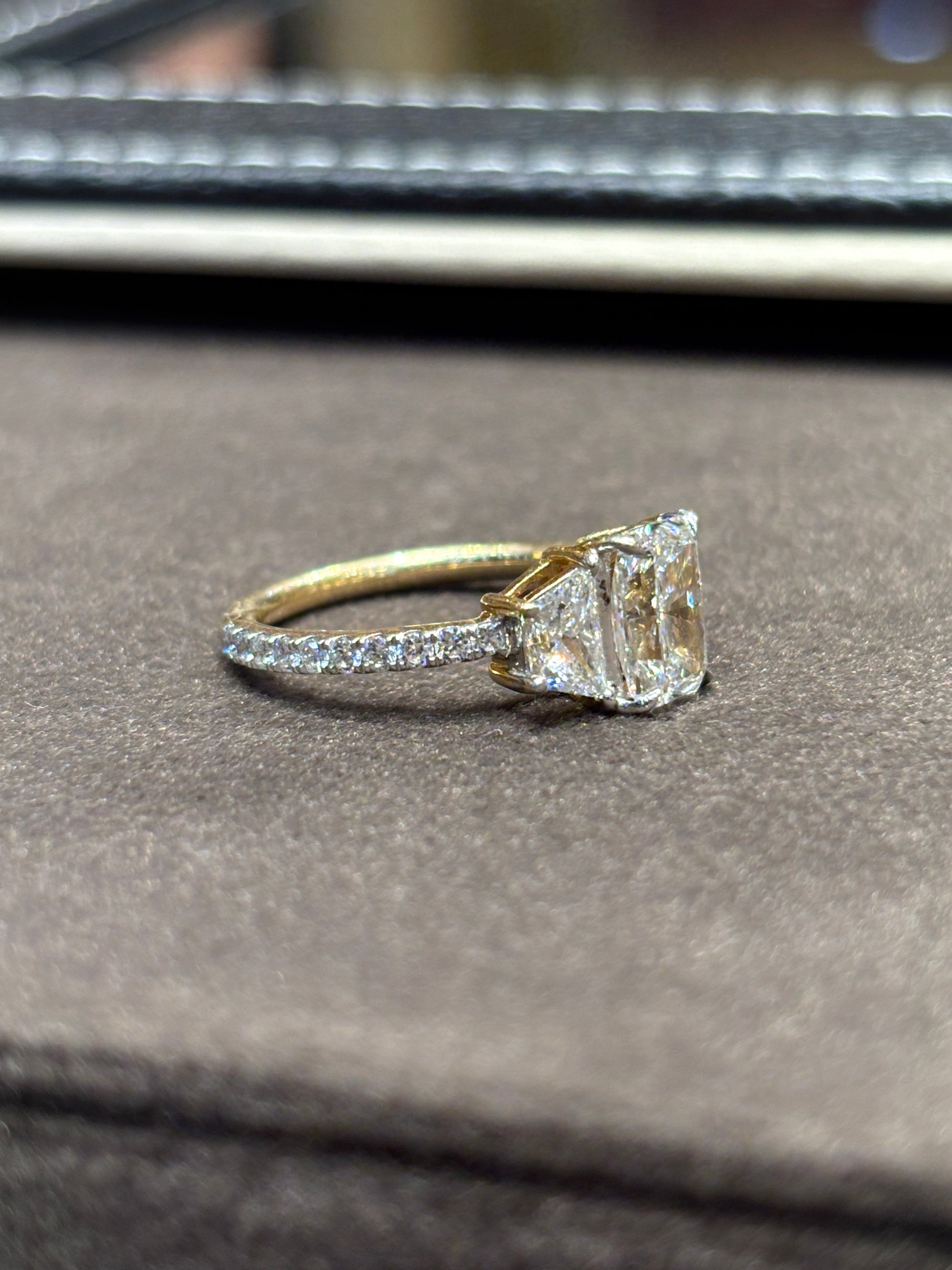 Fiona Diamonds Jovielle 1.5ct Radiant Lab Diamond Three Stone Ring in 14K Yellow Gold on hand
