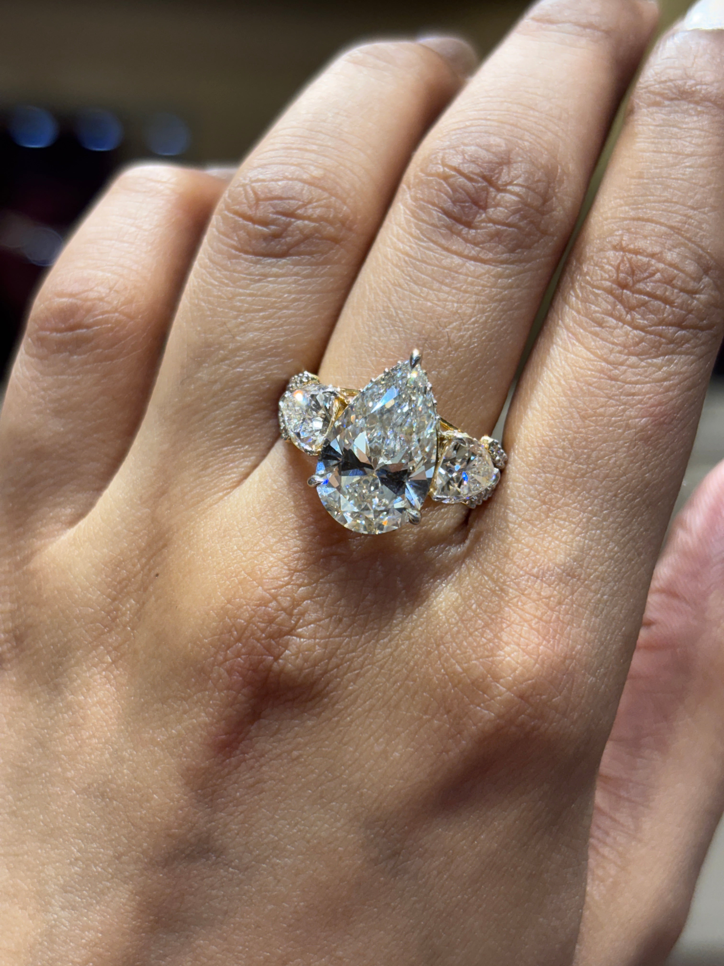 Fiona Diamonds Eloura Bliss 5ct Pear Lab Diamond Three Stone Ring in 18K Yellow Gold on hand