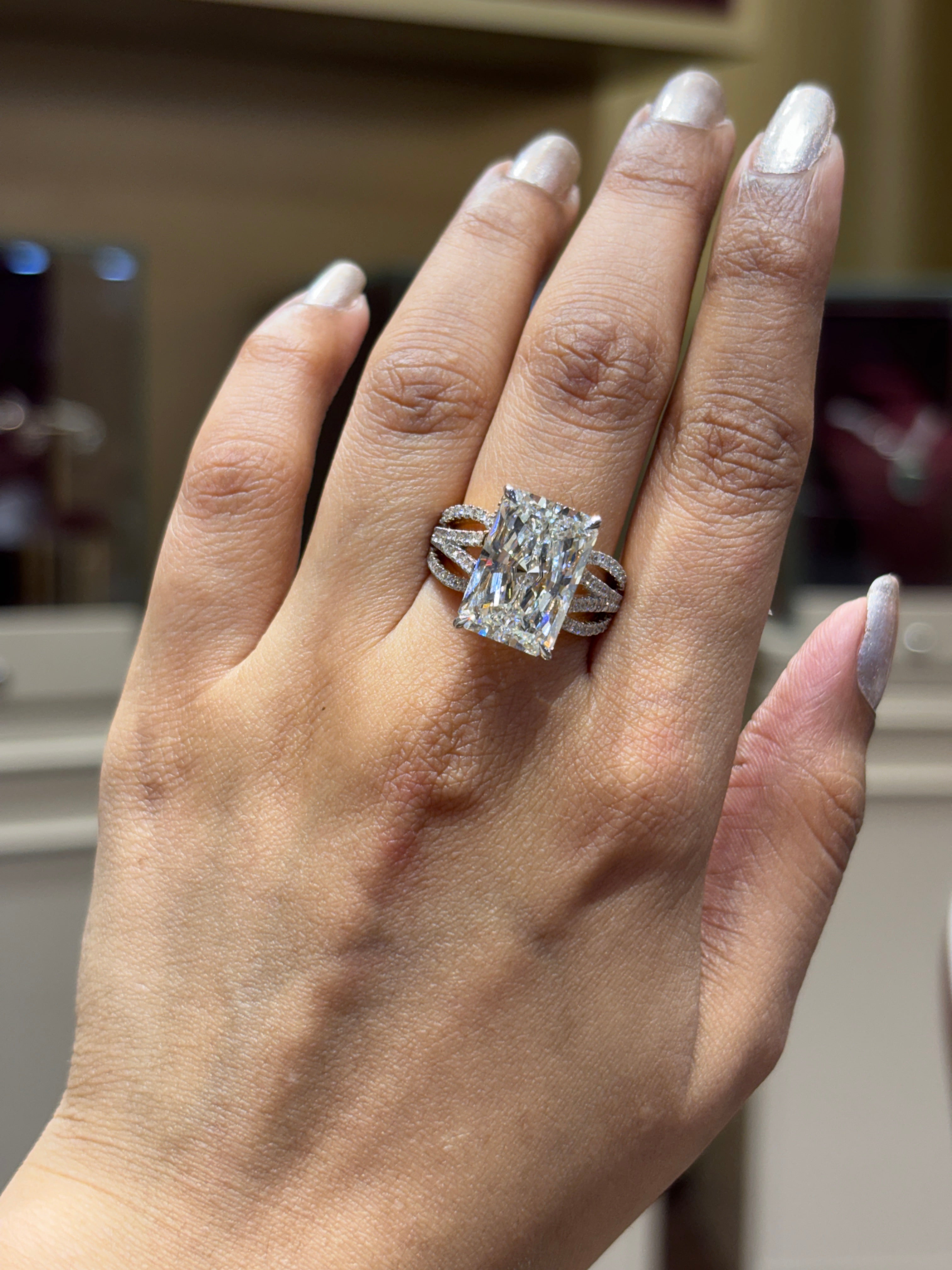 Close-up of Thalya 8.8ct Whisper Emerald Lab Diamond Side Stone Solitaire Ring set in 18K Yellow Gold by Fiona Diamonds