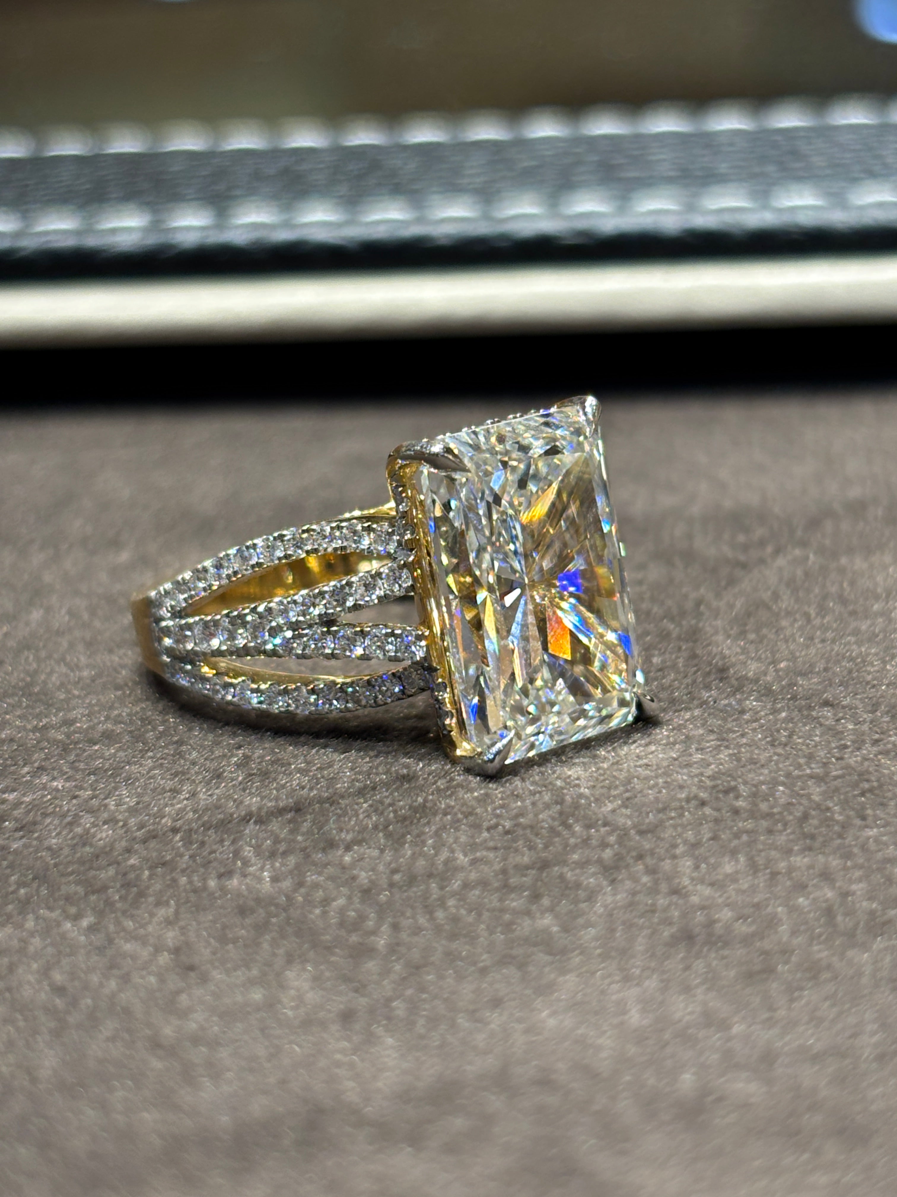 Top view of Thalya 8.8ct Whisper Emerald Lab Diamond Side Stone Solitaire Ring in 18K Yellow Gold  Fiona Diamonds