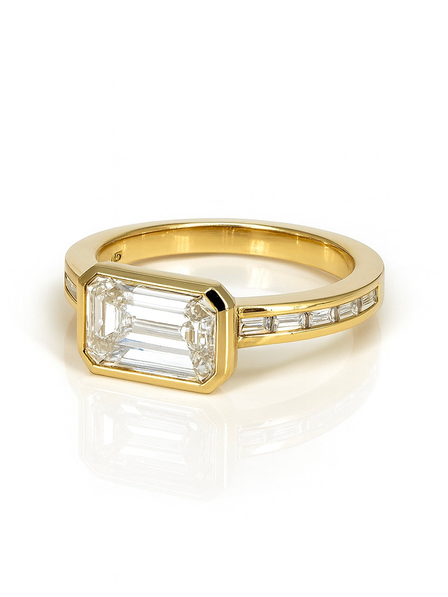 Side view of Blush Horizon 2ct Emerald Lab Diamond Side Stone Solitaire Ring in 18K Yellow Gold  Fiona Diamonds