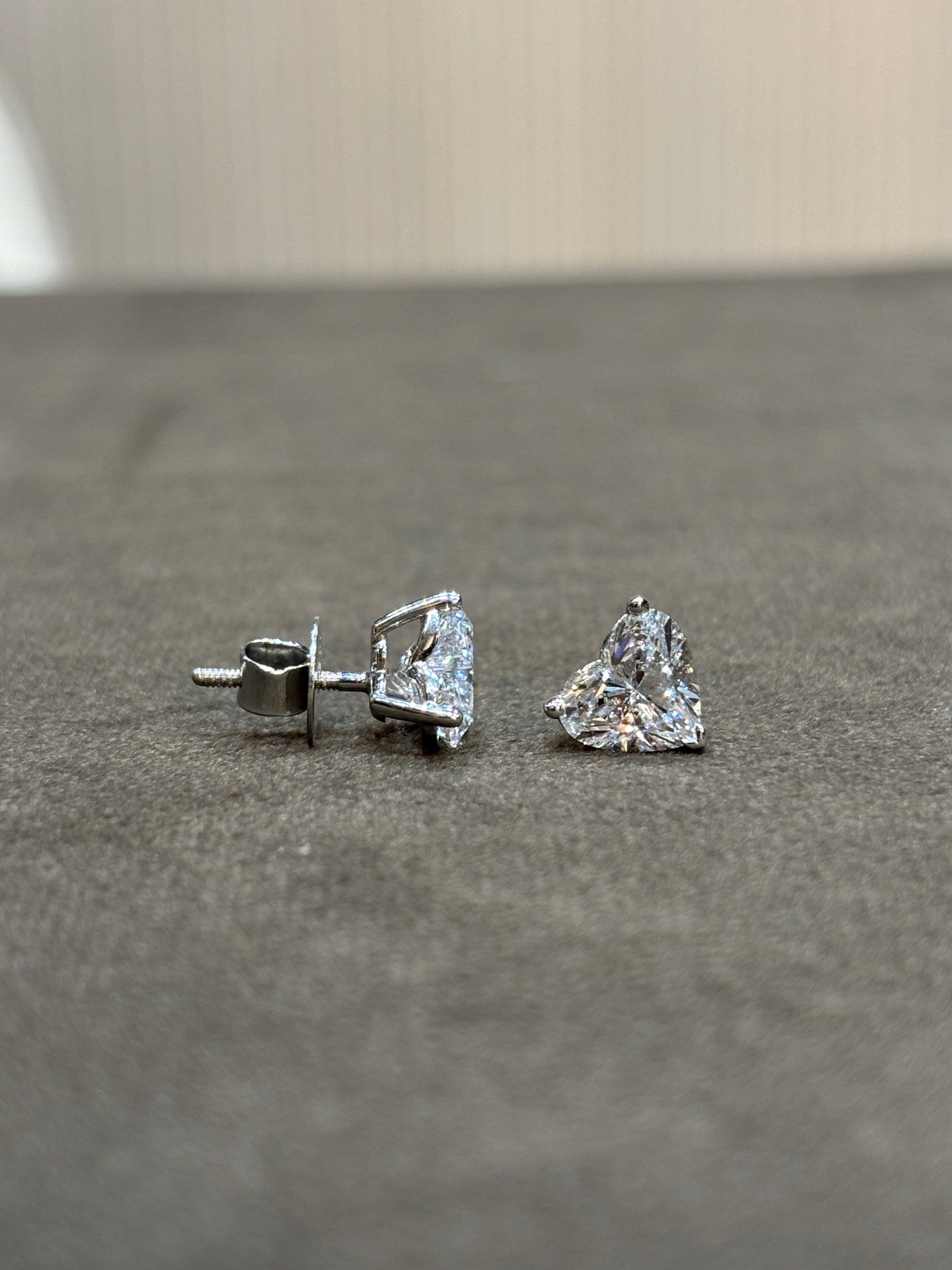 Close-up of Nimbus Glow Heart Lab Diamond Solitaire Stud in 18K White Gold by Fiona Diamonds