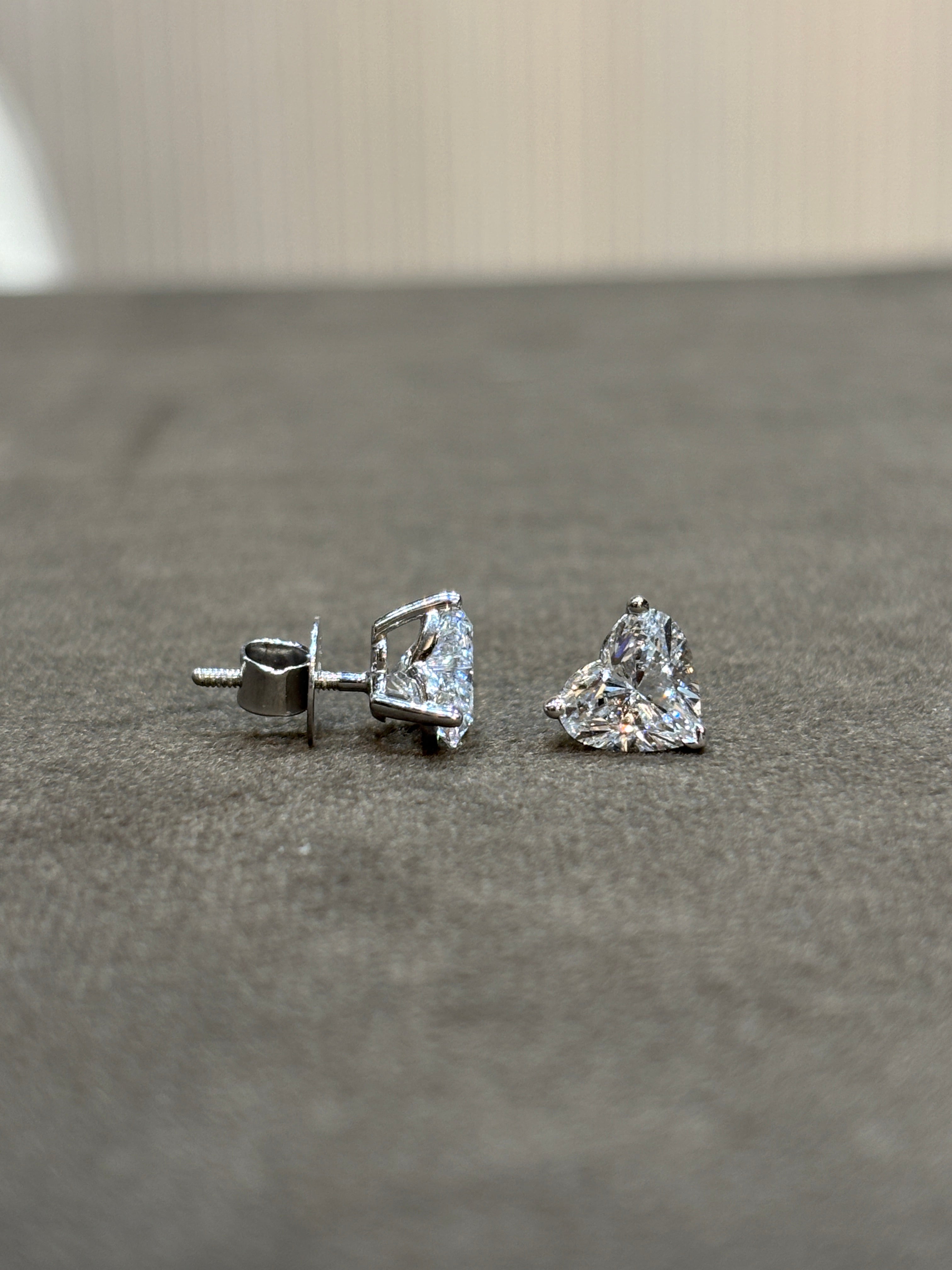 Close-up of Nimbus Glow Heart Lab Diamond Solitaire Stud in 18K White Gold by Fiona Diamonds