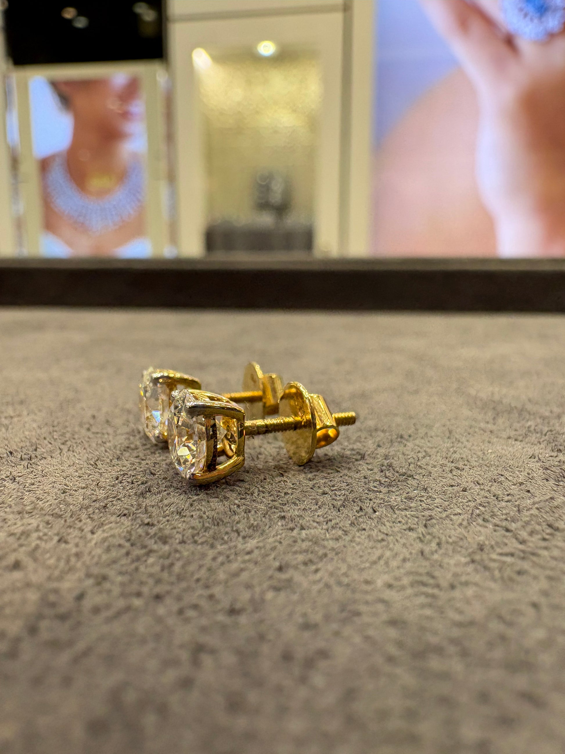 Top view of Elowen Mist Round Lab Diamond Stud Earrings in 18K Yellow Gold - Fiona Diamonds