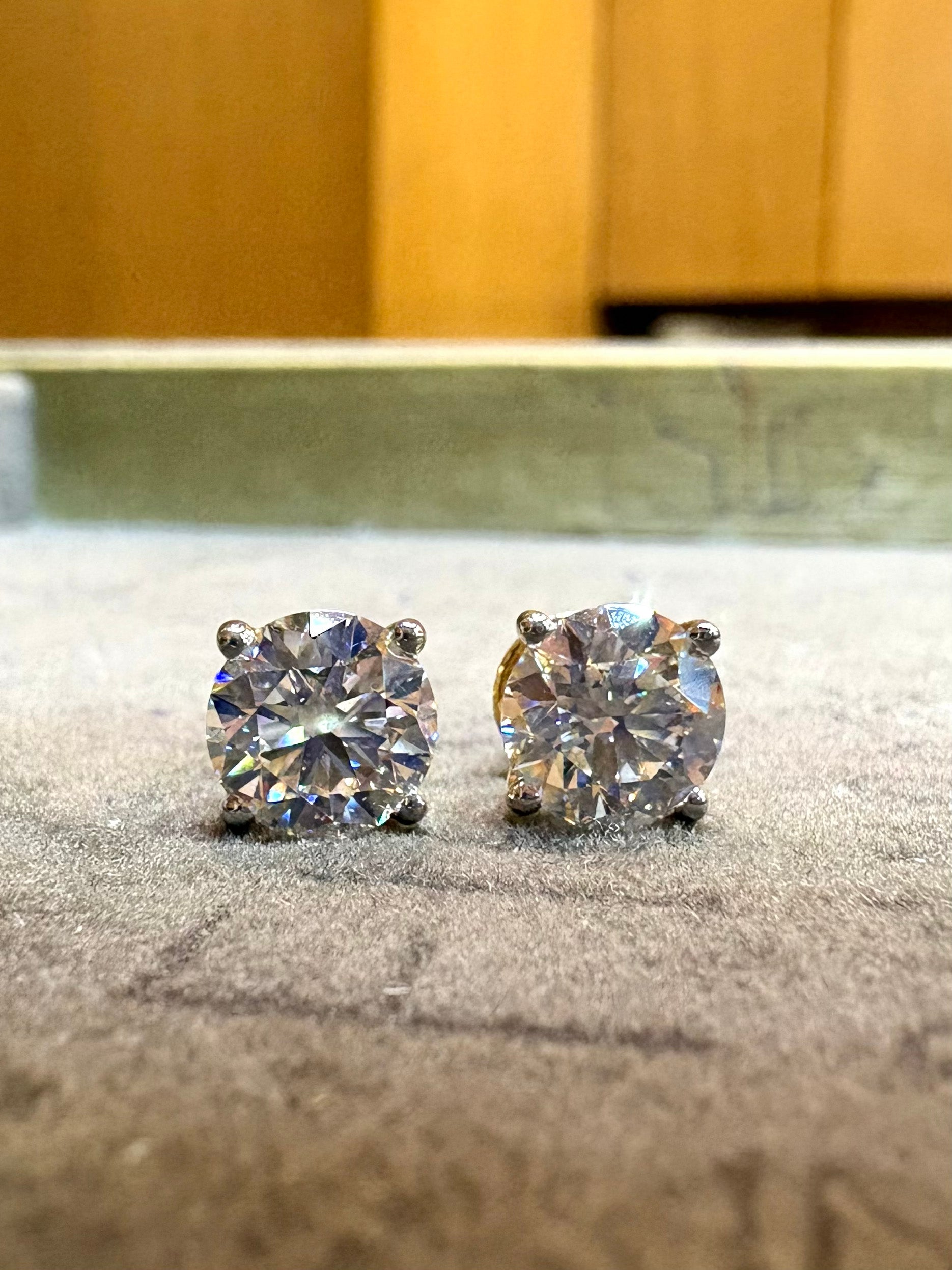 Close-up of Saevin Veil Round Lab Diamond Solitaire Stud in 18K Yellow Gold by Fiona Diamonds