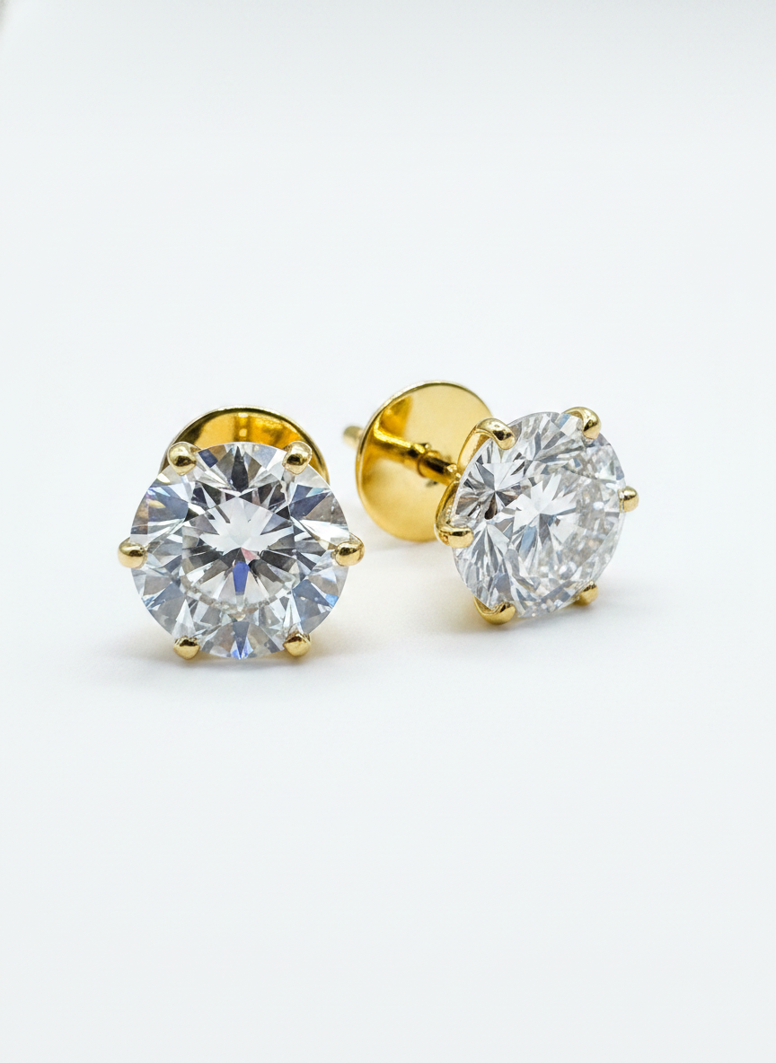 Close-up of Fallyn Glow Round Lab Diamond Solitaire Stud in 18K Yellow Gold by Fiona Diamonds
