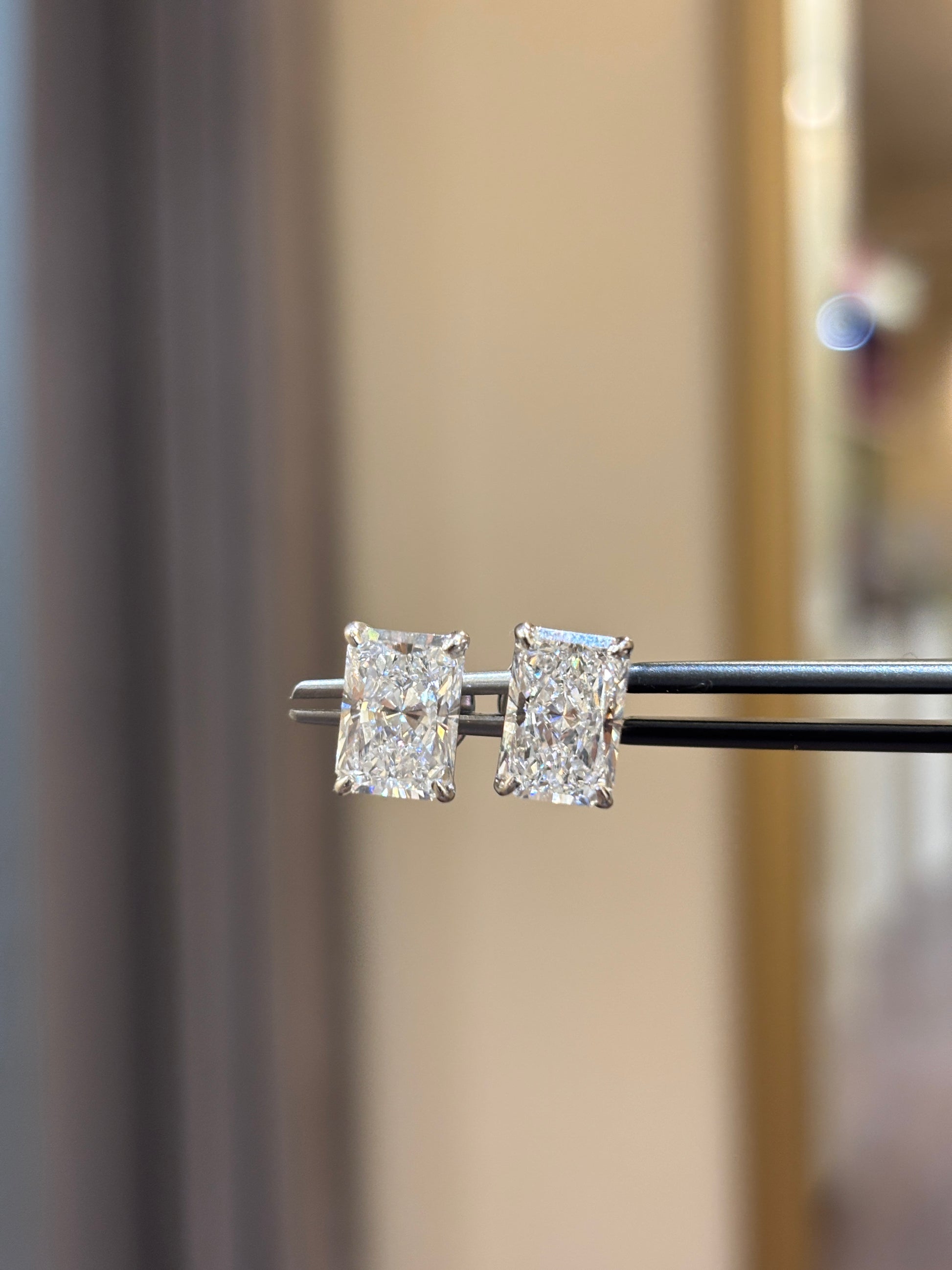 Close-up of 3ct Radiant Radiant Lab Diamond Solitaire Stud in 14K White Gold by Fiona Diamonds