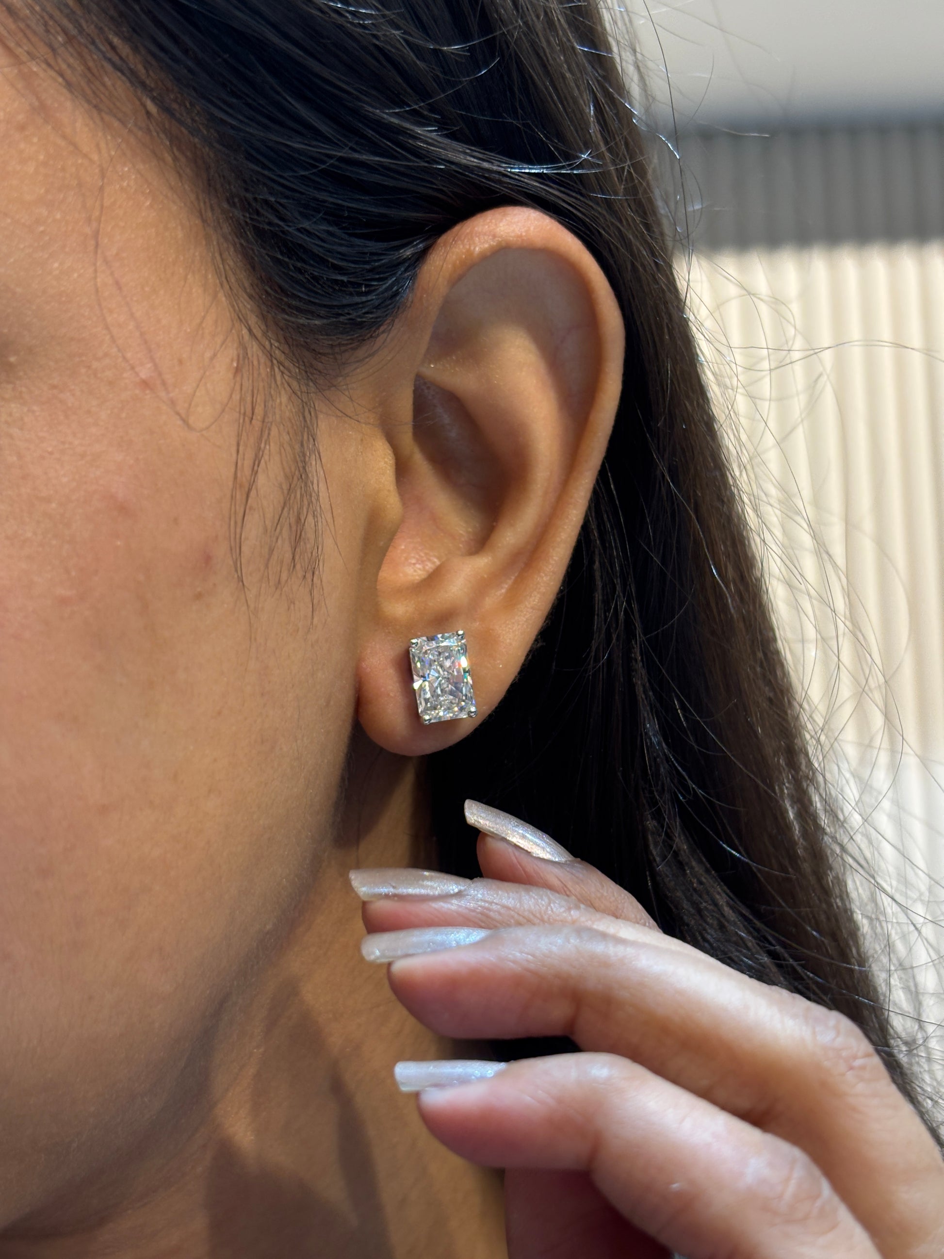 Close-up of Vira Fade 2.5ct Round Radiant Lab Diamond Solitaire Stud in 18K White Gold by Fiona Diamonds