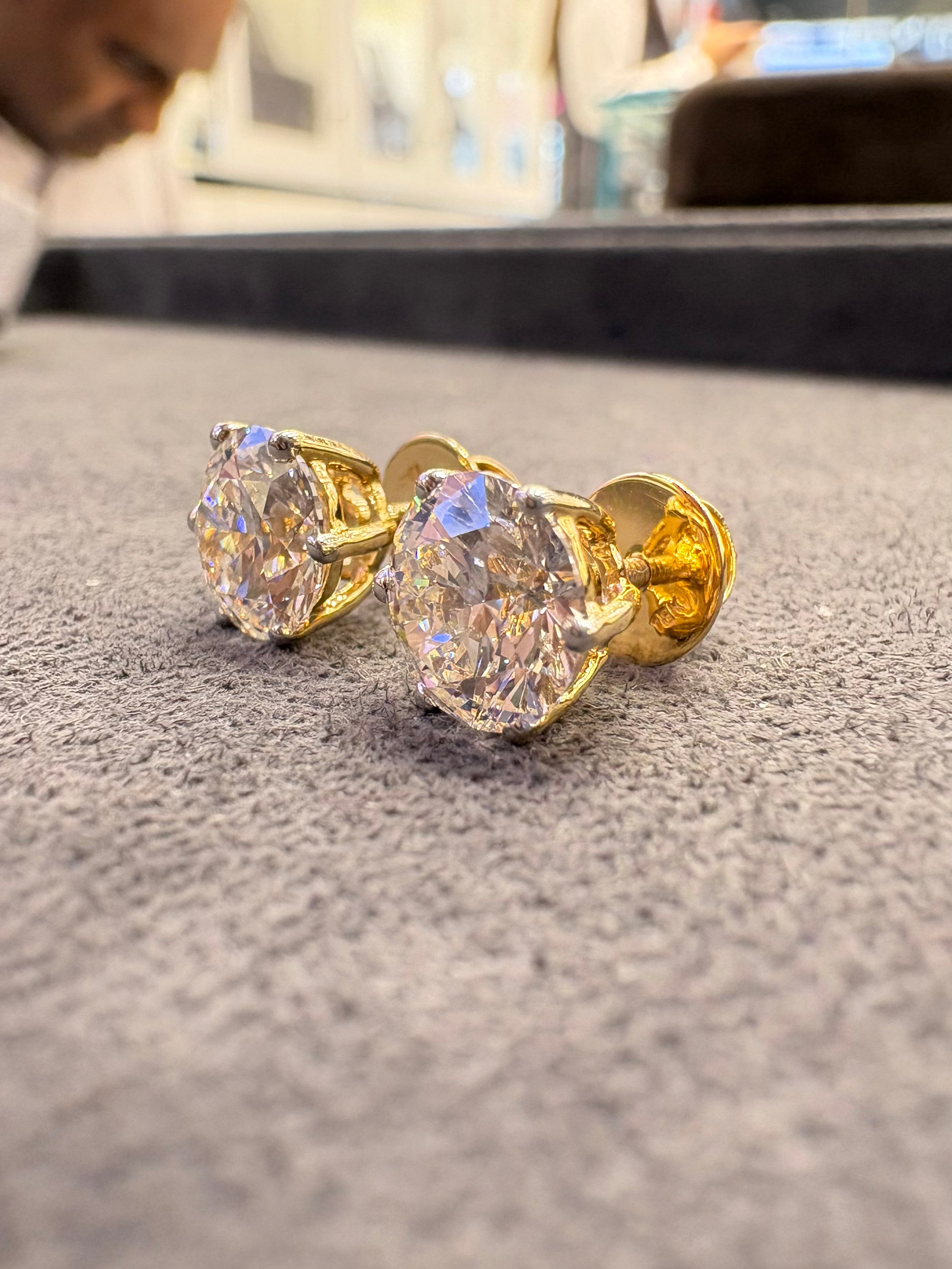 Side view of Bexley Flare Round Lab Diamond Stud Earrings in 18K Yellow Gold - Fiona Diamonds