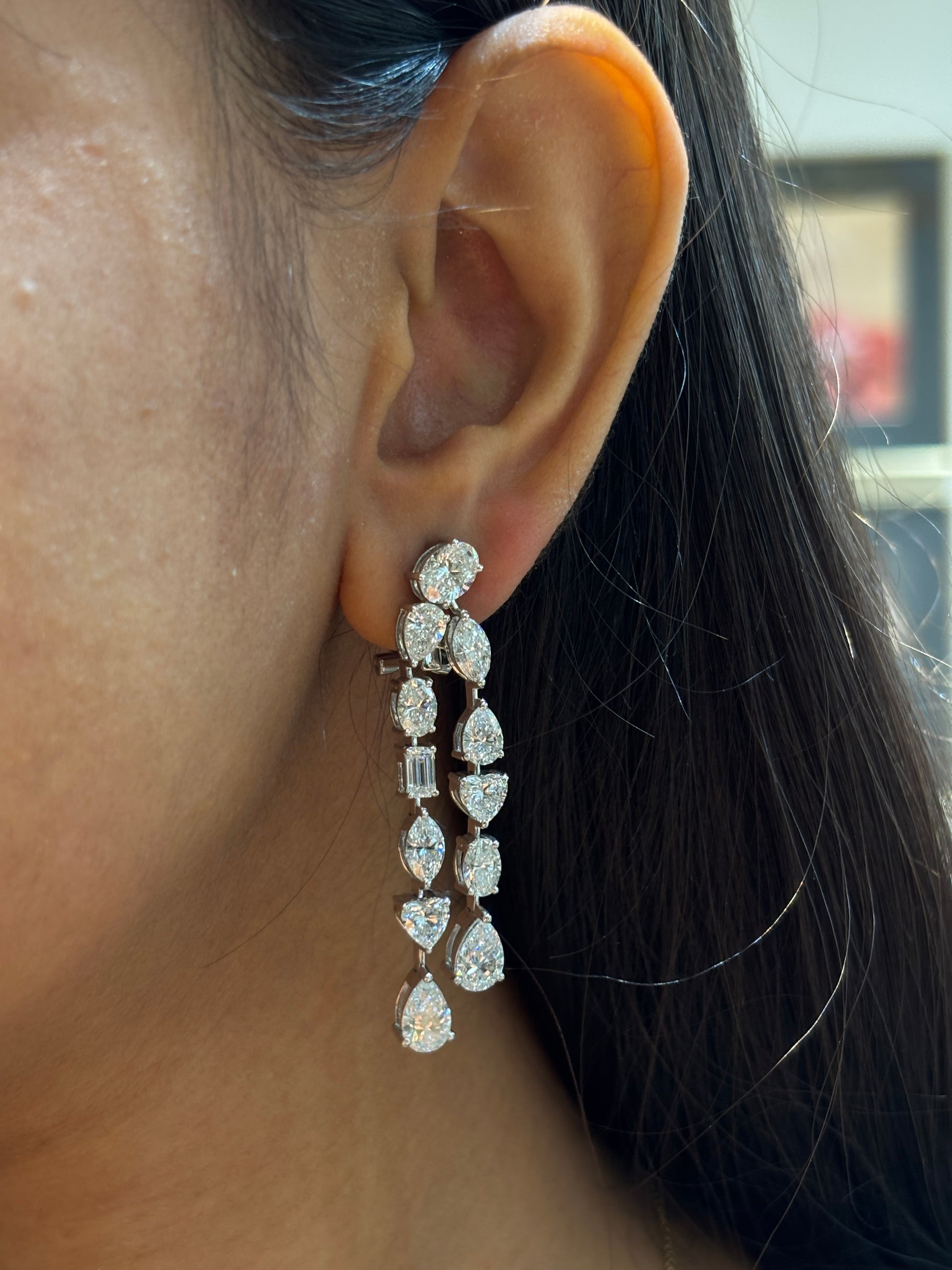 Close-up of Youlan Pear Lab Diamond Dangler Earrings in 14K White Gold by Fiona Diamonds