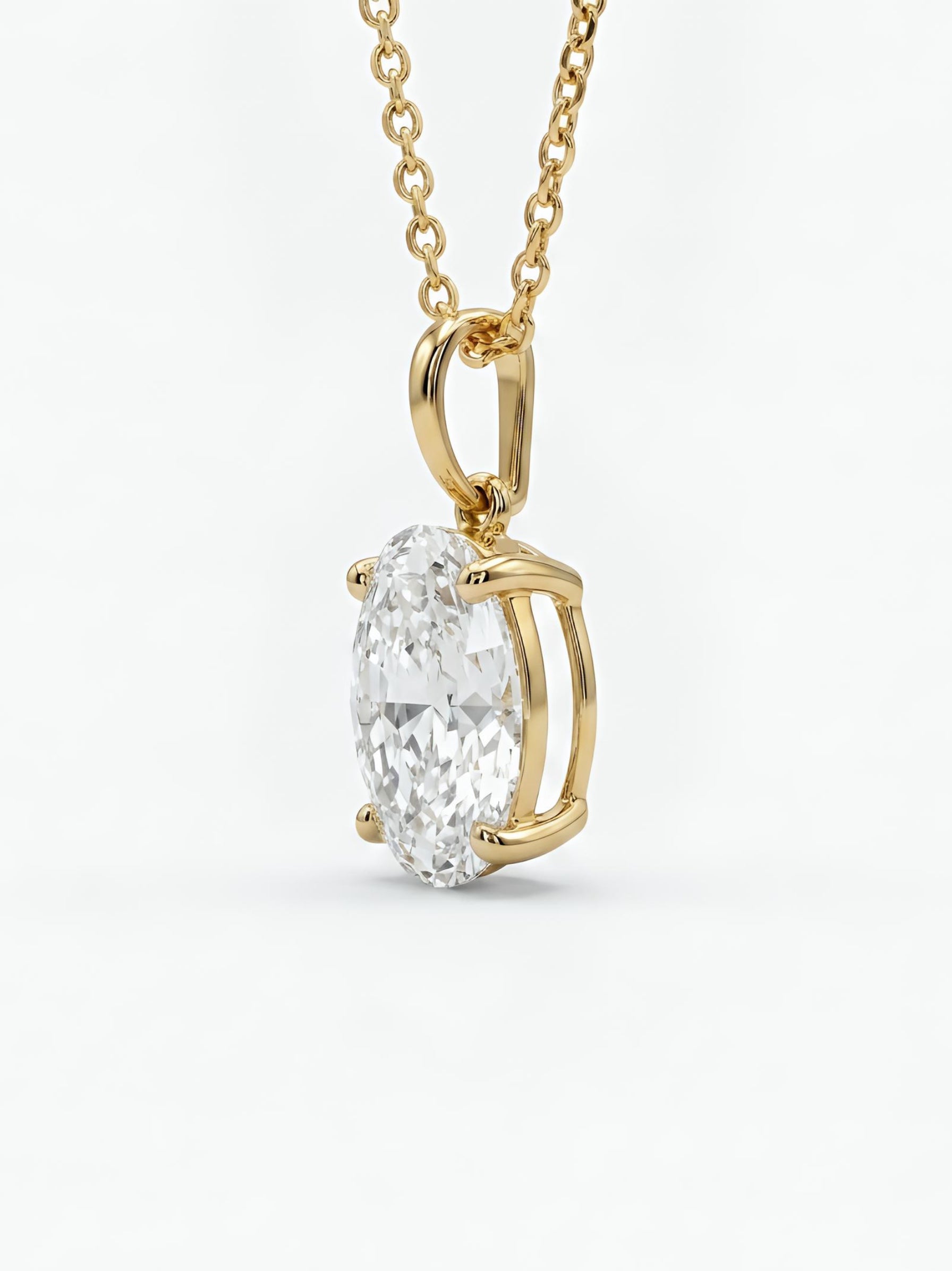 Close-up of Raven Lore Oval Lab Diamond Solitaire Pendant in 18K Yellow Gold by Fiona Diamonds